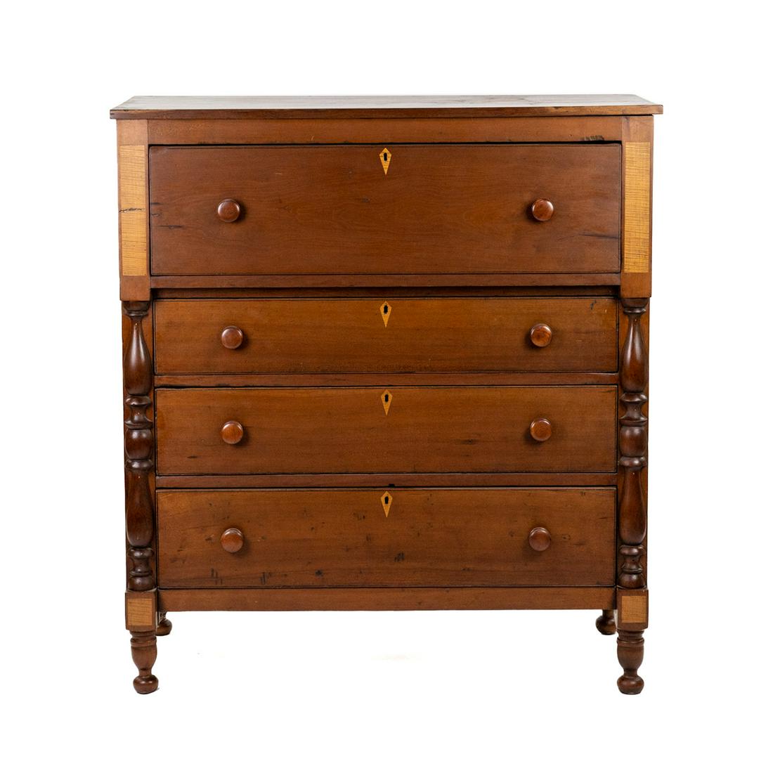 American Empire Butler's Chest Dresser: A 19th century American Empire Butler's chest or dresser constructed of maple with inlaid lacewood panels and key hole covers. SHIPPING Atlanta Auction Gallery will not ship this lot in house. The buy