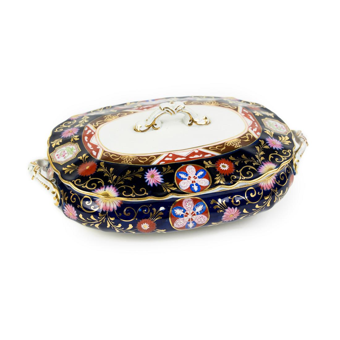 Ashworth Ironstone China Cobalt Blue Casserole Dish: A antique Ashworth Bros. England Ironstone China cobalt blue and gold floral lidded vegetable or casserole dish with gold accents and molded handles on lid and sides. Marked on underside.