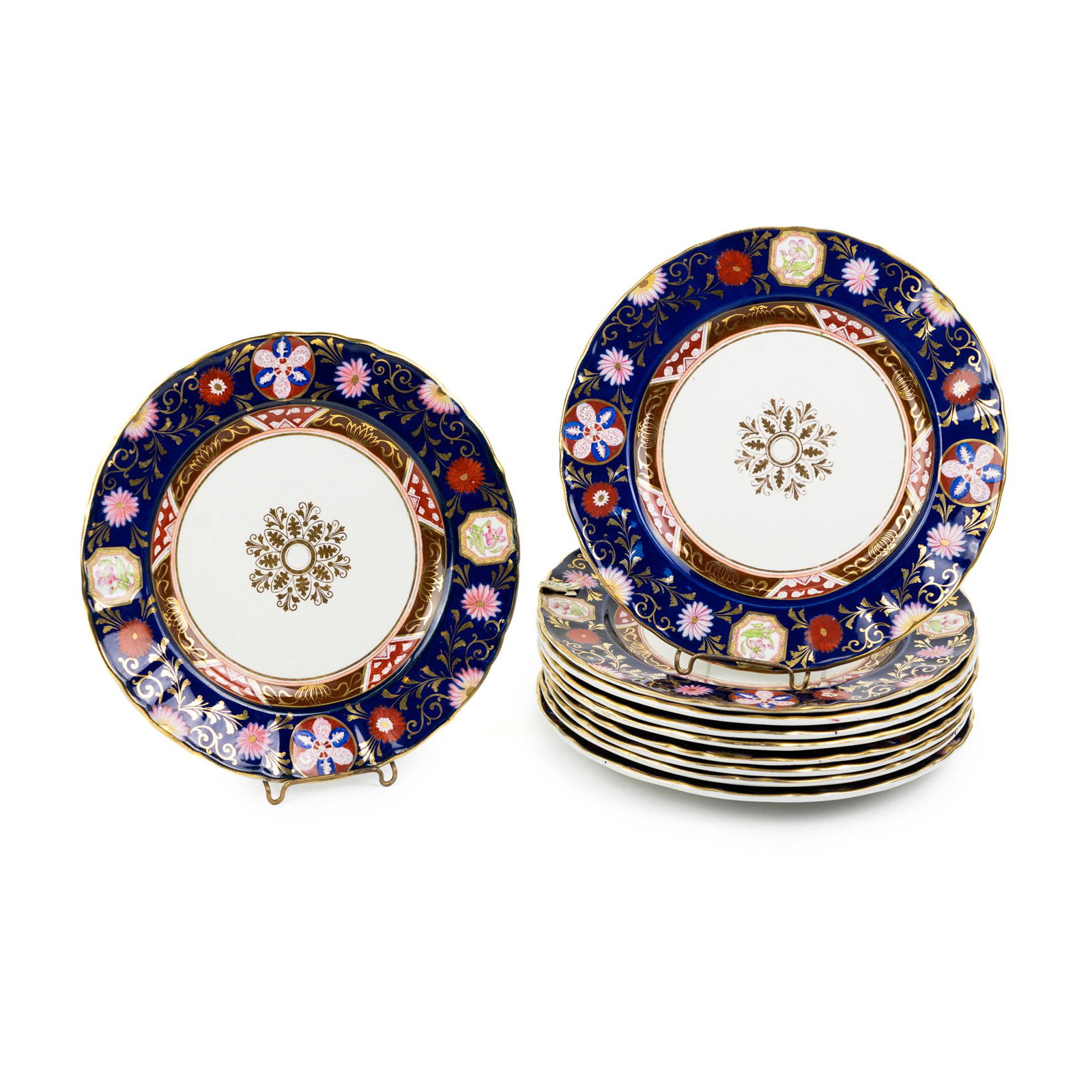 (9) Ashworth Ironstone China Cobalt Blue Dinner Plates: A set of nine (9) Ashworth Bros. England Ironstone China cobalt blue and gold floral dinner plates with scalloped design. Marked on undersides.