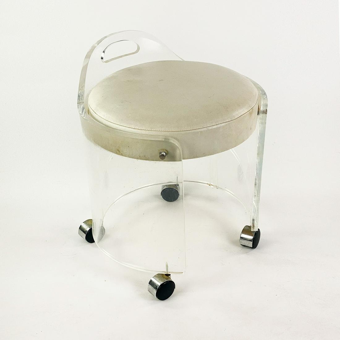 Hill Manufacturing Lucite & Leather Boudoir Chair: A lucite boudoir chair with white leather seat on lucite frame and casters manufactured by Hill Manufacturing Co. SHIPPING Atlanta Auction Gallery will not ship this lot in house. The buyer is respons