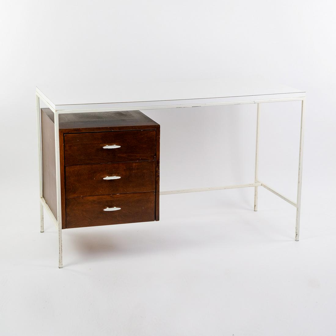 MCM Vista Of California Walnut 3 Drawer White Steel Desk: A Mid-Century Modern Vista Of California desk having a suspended three walnut cabinet to the left and a square steel tube white painted frame with white laminate top. Cabinet features white powder coa