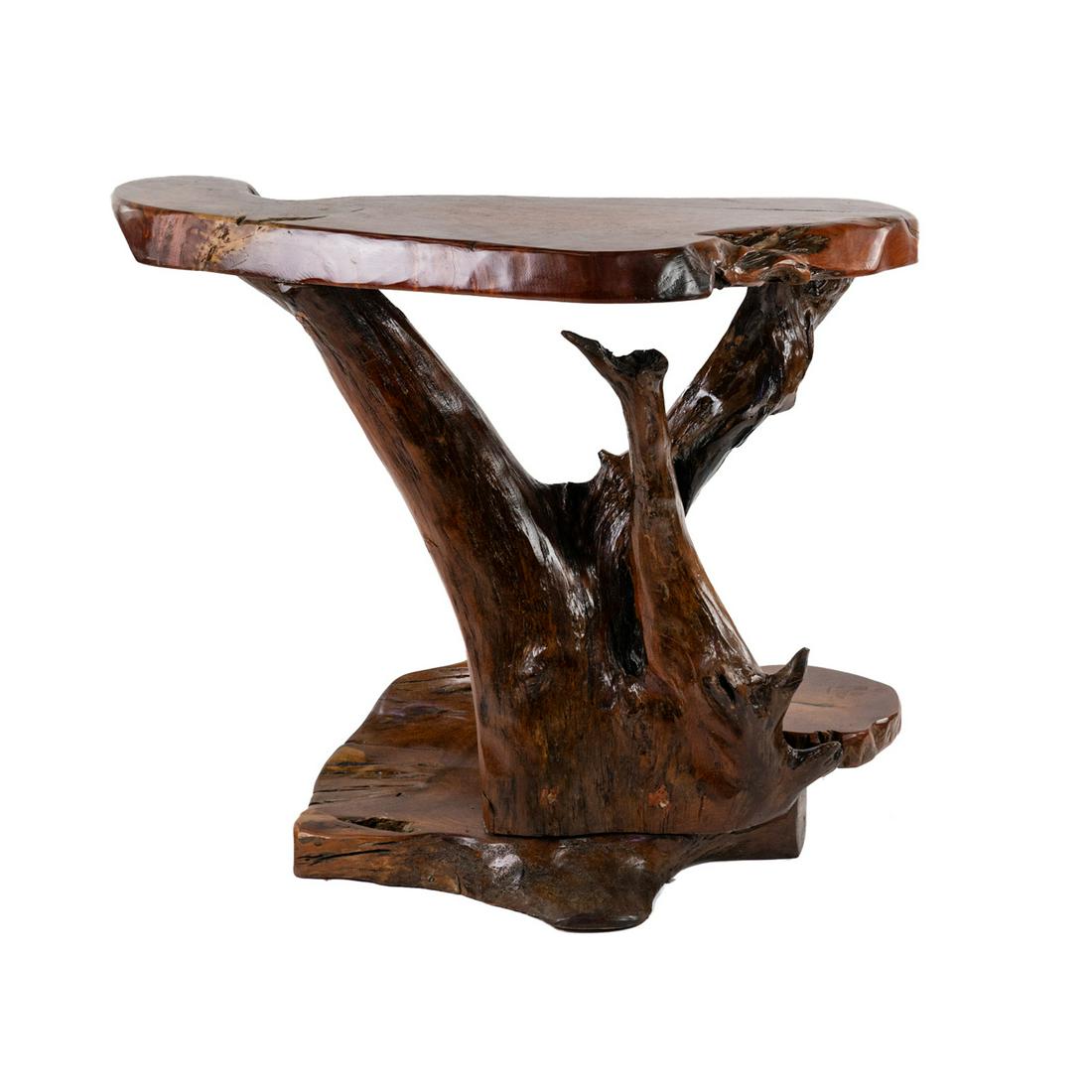 Arts & Crafts Teak Freeform Root Side Table: A vintage teak freeform root table having live edge top with biomorphic design resting atop wood carved base. Unmarked. SHIPPING Atlanta Auction Gallery will not ship this lot in house. The buyer is r