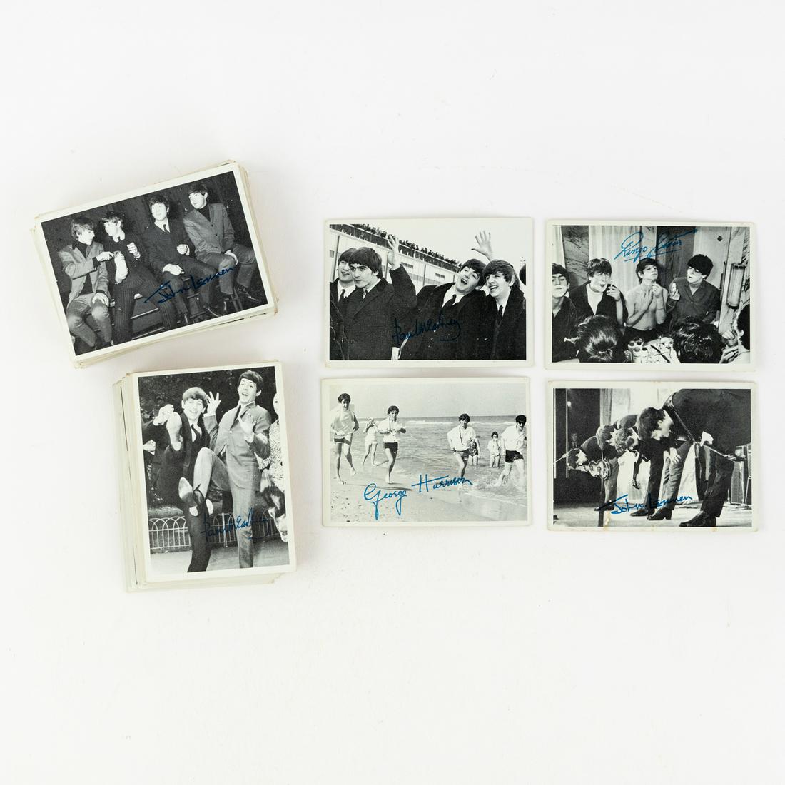 (50) 1964 Topps 3rd Series Beatles Trading Cards: A group of 50 Topps 1964 3rd series Beatles black and white photo trading cards featuring portraits of band members, each having a blue facsimile autograph from either John Lennon, Paul McCartney, Geo