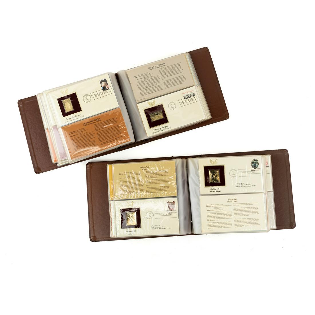 (2) 22kt Golden Replicas of US Stamps First Day Albums: A group of 2 completed 'Golden Replicas of United States Stamps' albums containing First Day issues with their 22kt gold surface replicas. One album contains 40 golden replica stamps and the other con