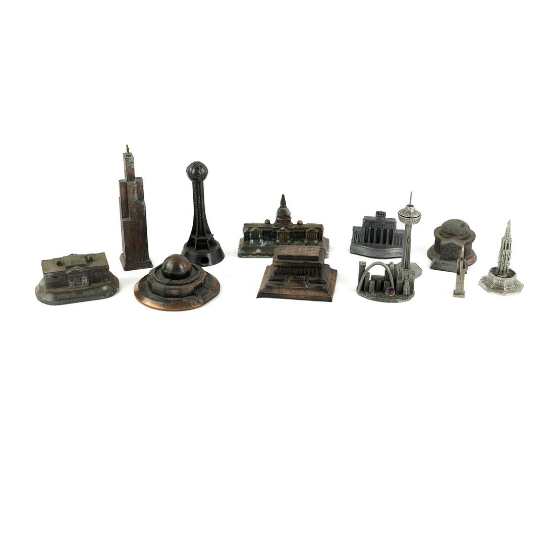 (12) Metal Souvenir Miniature Building Replicas: A group of 12 metal souvenir miniature buildings including Sears Tower, a Sunsphere pencil sharpener, Washington D.C. Capitol Building, Jefferson Memorial, Lincoln Memorial, White House, the Adler Pla