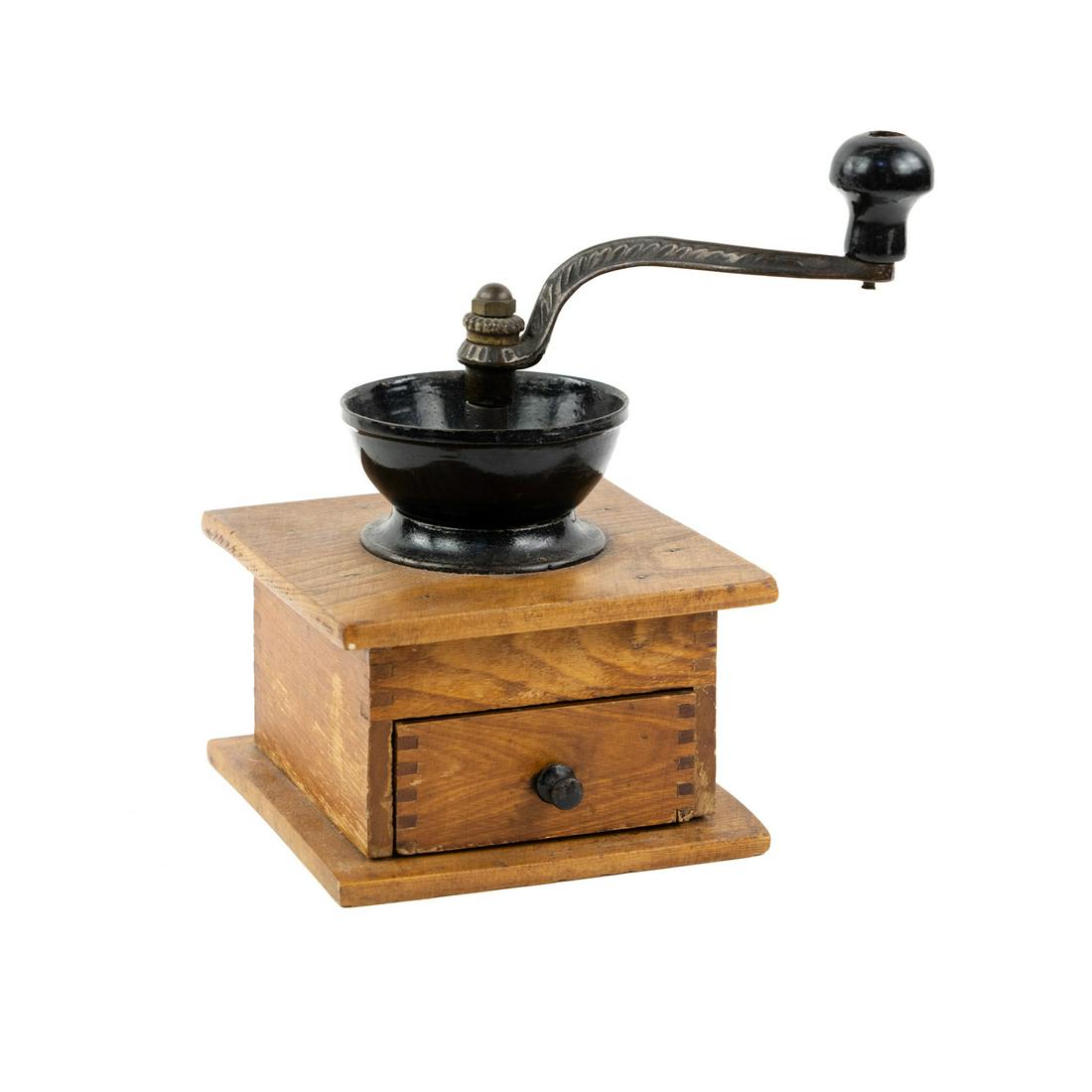 Manual Coffee Mill Bean Burr Grinder: A manual hand-crank burr coffee grinder on a wooden square base with a drawer for catching grounds.