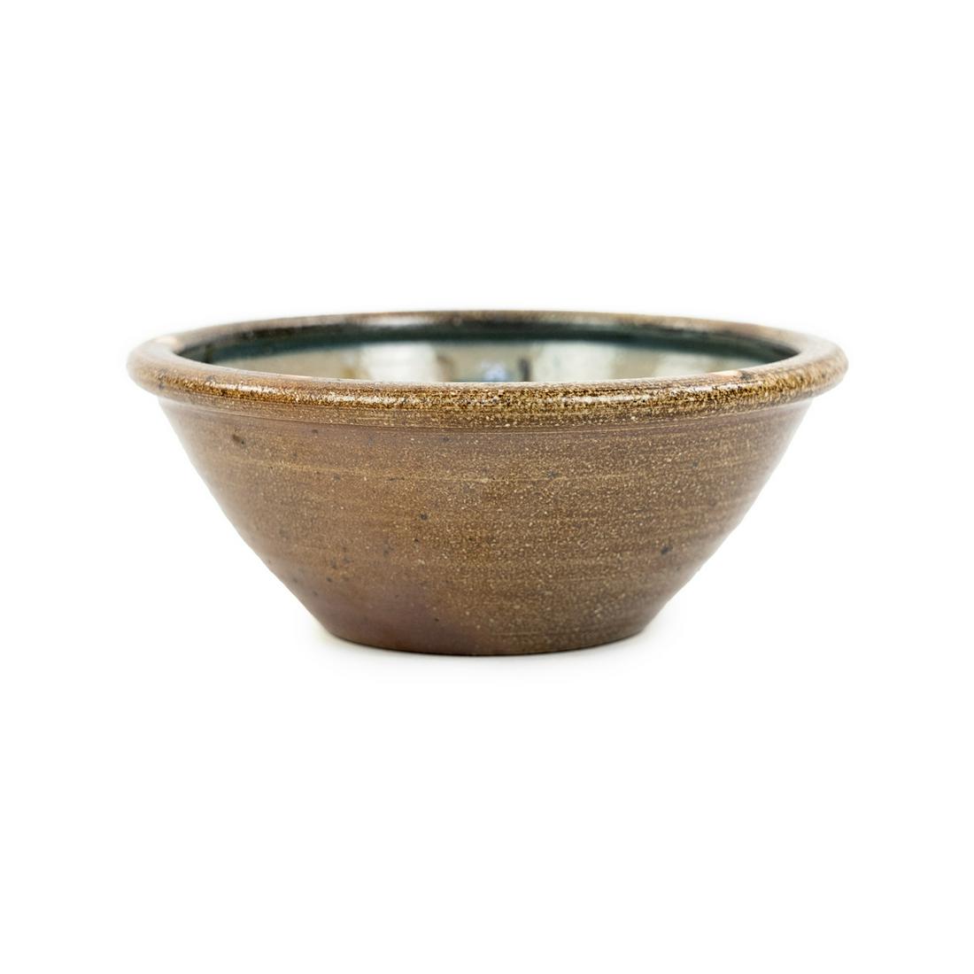 Charley Pritchard Mark Hewitt Pottery Bowl: A Mark Hewitt Pottery salt glazed stoneware art pottery bowl made by apprentice Charley Pritchard having a decorated interior with unglazed spot accents around the rim and on the bottom. Stamped 'WMH