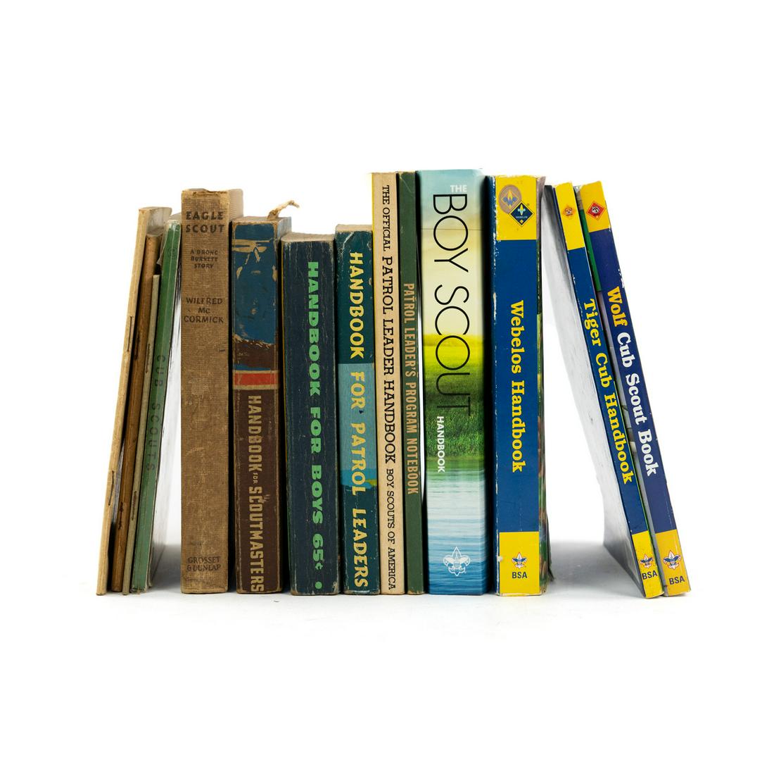 (13) Vintage Boy and Cub Scout Handbooks and Guides: A group of 13 vintage Boy Scout and Cub Scout paperback handbooks and guides including 'Handbook for Boys', 'Handbook for Scoutmasters', 'Handbook for Patrol Leaders', 'The Official Patrol Leader Hand