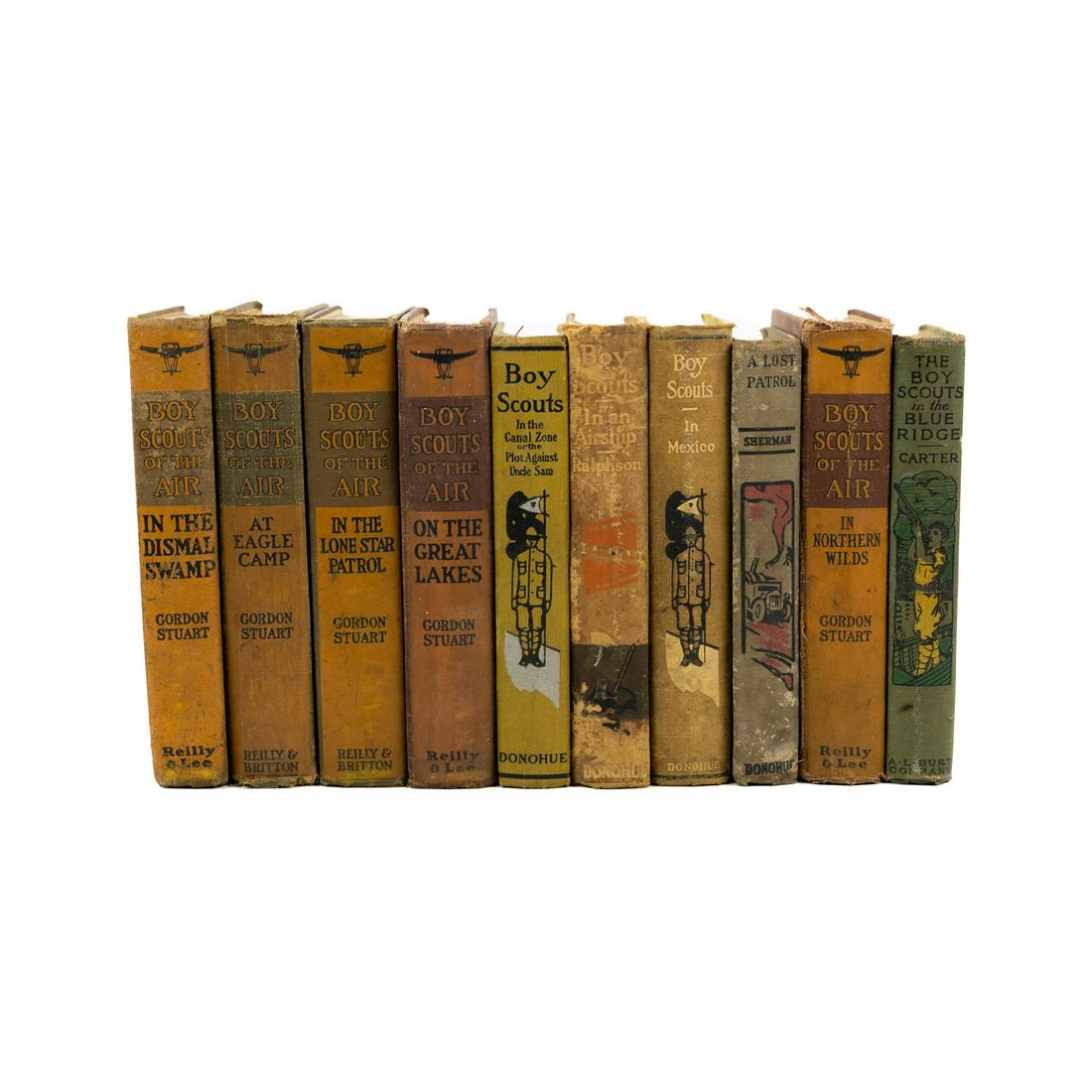 (10) Vintage Boy Scout Fiction Hardcover Books: A group of 10 vintage hardcover Boy Scout fiction books including Gordon Stuart 'Boy Scouts of The Air' series - 'On The Great Lakes', 'In The Lone Star Patrol', 'At Eagle Camp', 'In The Dismal Swamp'