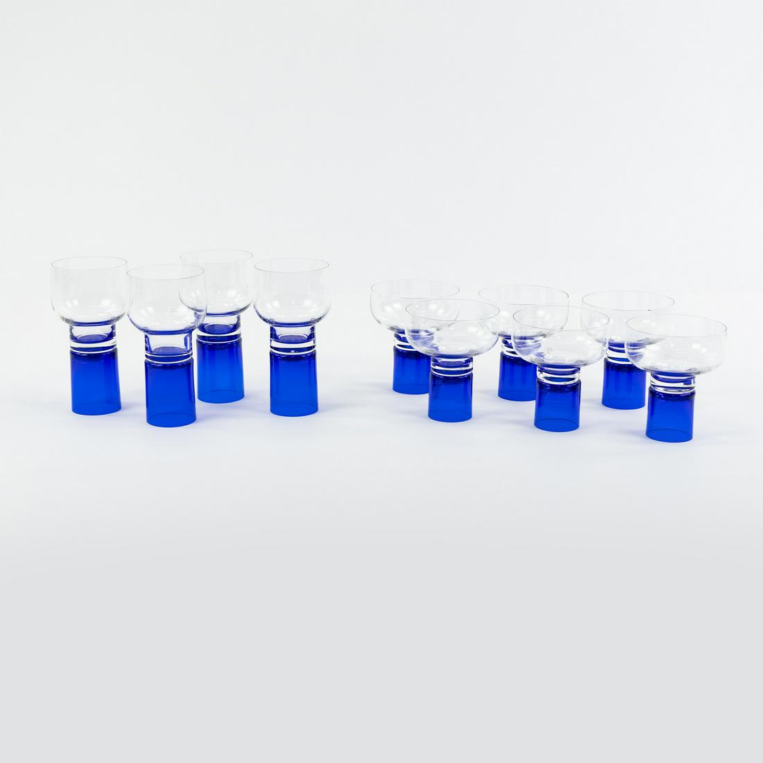 (10) Set of Cobalt Blue Wine Glasses by Pierre Cardin: A set of ten Pierre Cardin blue bottom wine glasses including four tall glasses and 6 shorter wine glasses, all with cobalt blue bases. Marked on bowls.