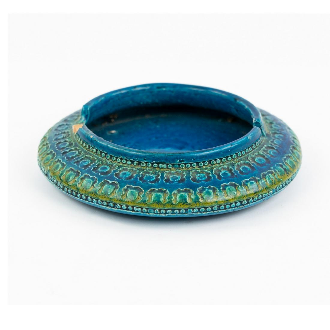 Aldo Londi for Bitossi 'Rimini Blu' Ashtray: An Aldo Londi for Bitossi 'Rimini Blu' glazed ceramic ashtray having an impressed repeating design and a cut out cigarette rest. Stamped on the bottom 'Made in Italy'.