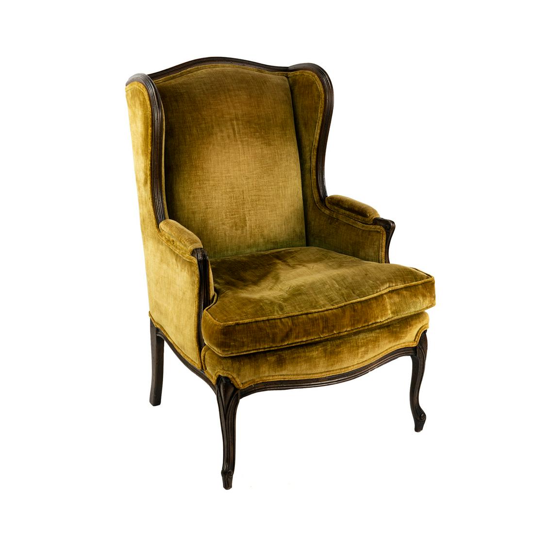 Bloomingdales Orleans Collection Velvet Wingback Chair: A Bloomingdale's Orleans Collection upholstered wingback bergere chair having velvet mustard upholstery resting atop cabriole legs. SHIPPING Atlanta Auction Gallery will not ship this lot in house. Th