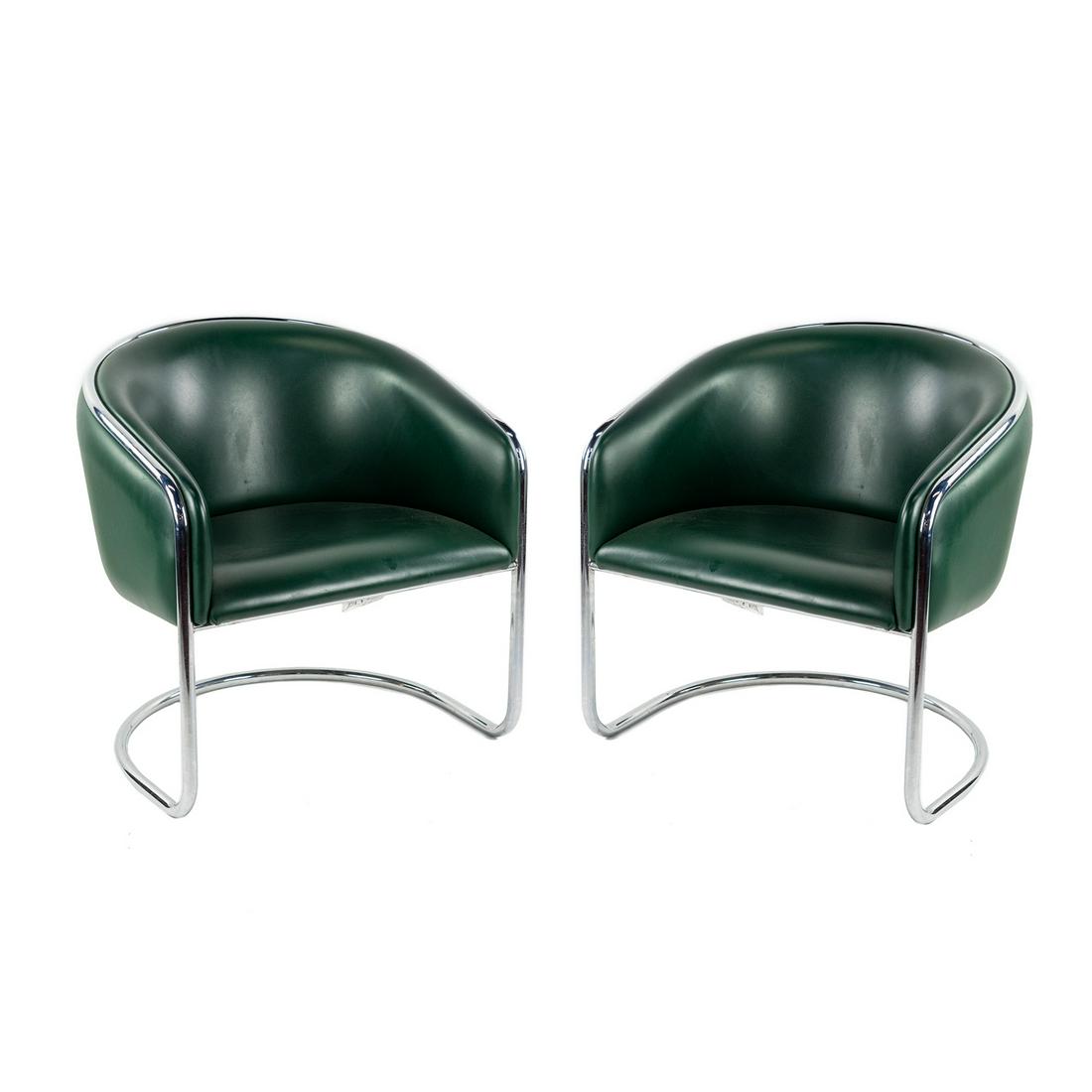 (2) Pair of Anton Lorenz for Thonet Green Club Tub Chairs: A pair (2) of Anton Lorenz and Joan Burgesses for Thonet 'Club Tub' chairs having green leather upholstery and chrome cantilivered frame. Tag on underside. Seat height: 16" SHIPPING Atlanta Auction Ga