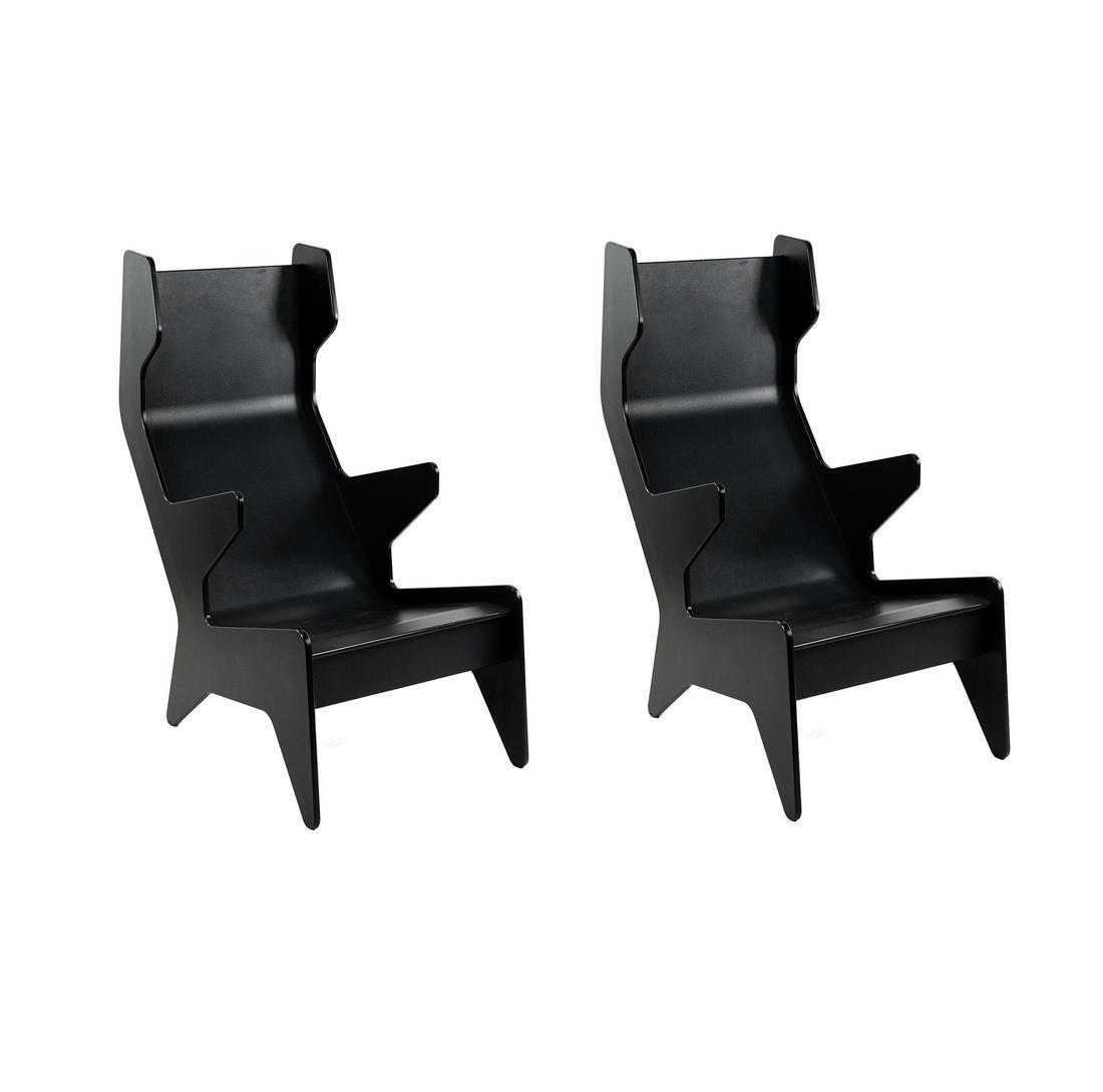 (2) Pair of Ralph Rapson for Loll Black Cave Chairs: A pair (2) of Ralph Rapson for Loll Designs 'Cave' lounge chairs in black having plastic angular shape with tapered legs. Marked on backs. SHIPPING Atlanta Auction Gallery will not ship this lot in ho