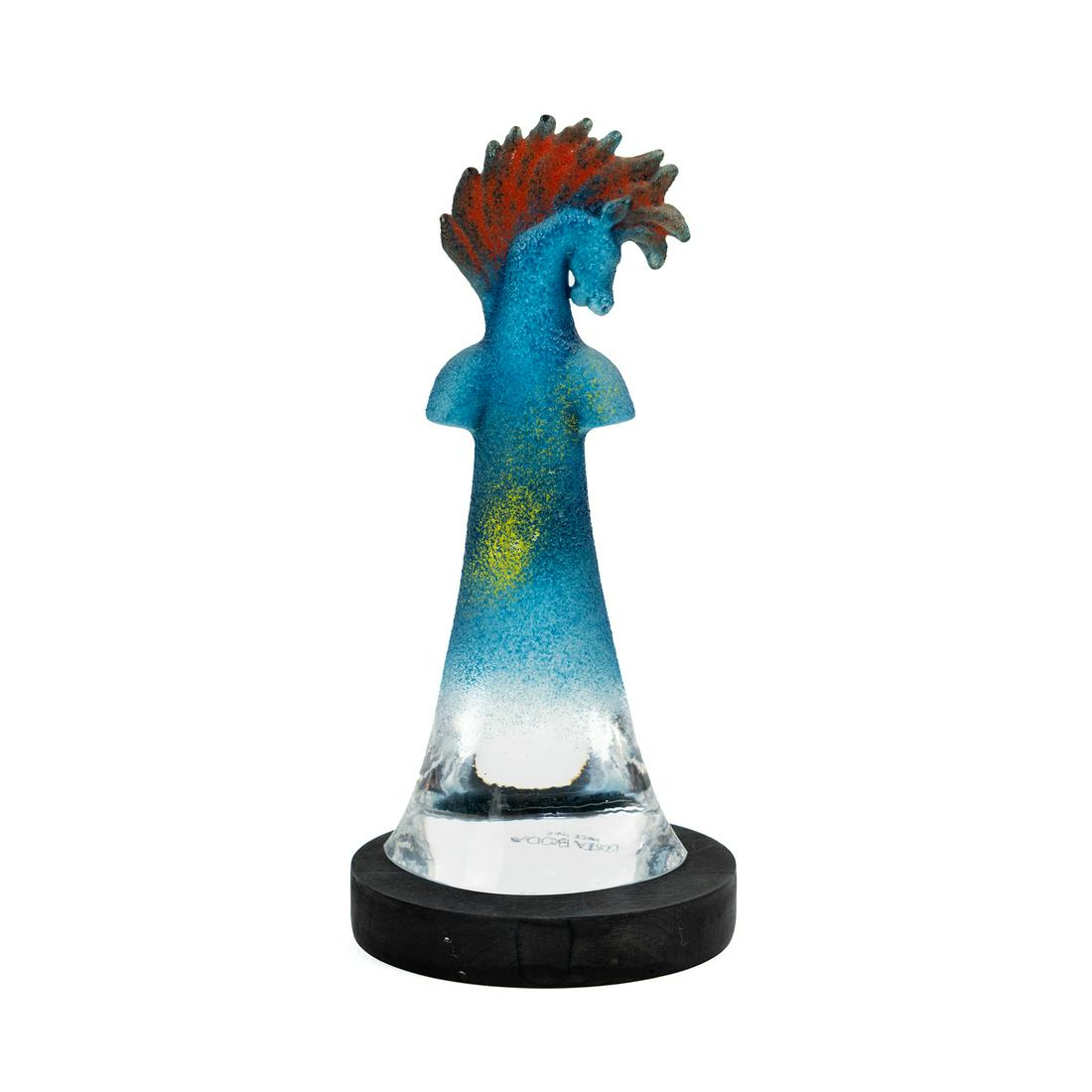 Kjell Engman for Kosta Boda Art Glass Horse Sculpture: A Kjell Engman (Sweden, b. 1946) for Kosta Boda art glass horse sculpture having blue, red, and yellow tones with black base. Marked on verso.