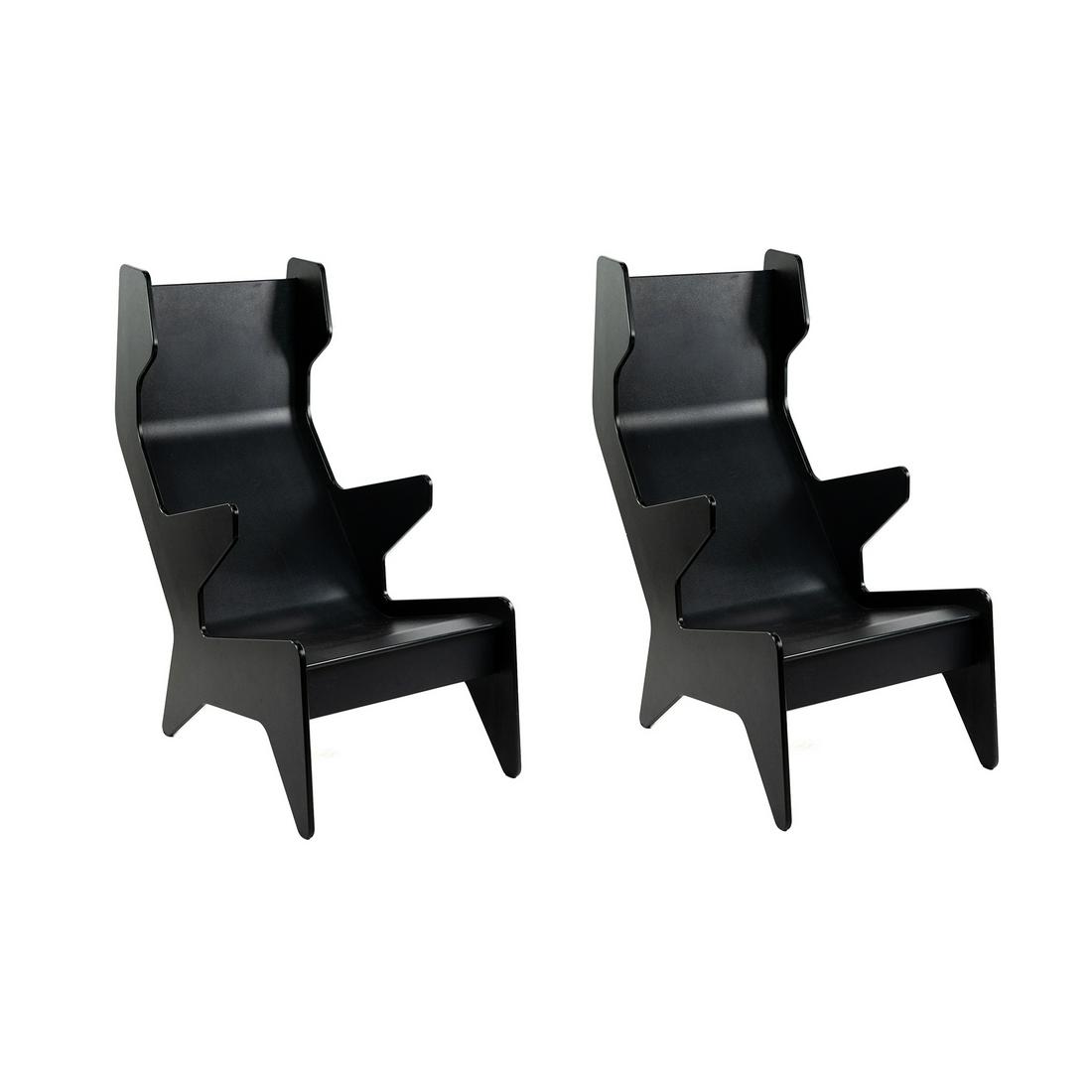 (2) Pair of Ralph Rapson for Loll Black Cave Chairs: A pair (2) of Ralph Rapson for Loll Designs 'Cave' lounge chairs in black having plastic angular shape with tapered legs. Marked on backs. SHIPPING Atlanta Auction Gallery will not ship this lot in ho