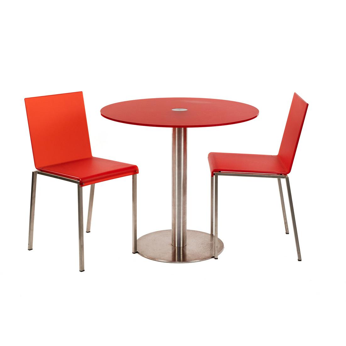 (3) Translucent Red and Chrome Bistro Table and Chair Set: A translucent red polycarbonate glass and chrome steel round dinette or bistro table with two matching chairs in the style of Driade. Chair measurements: 31.5" H x 14" W x 15". D SHIPPING Atlanta Auct