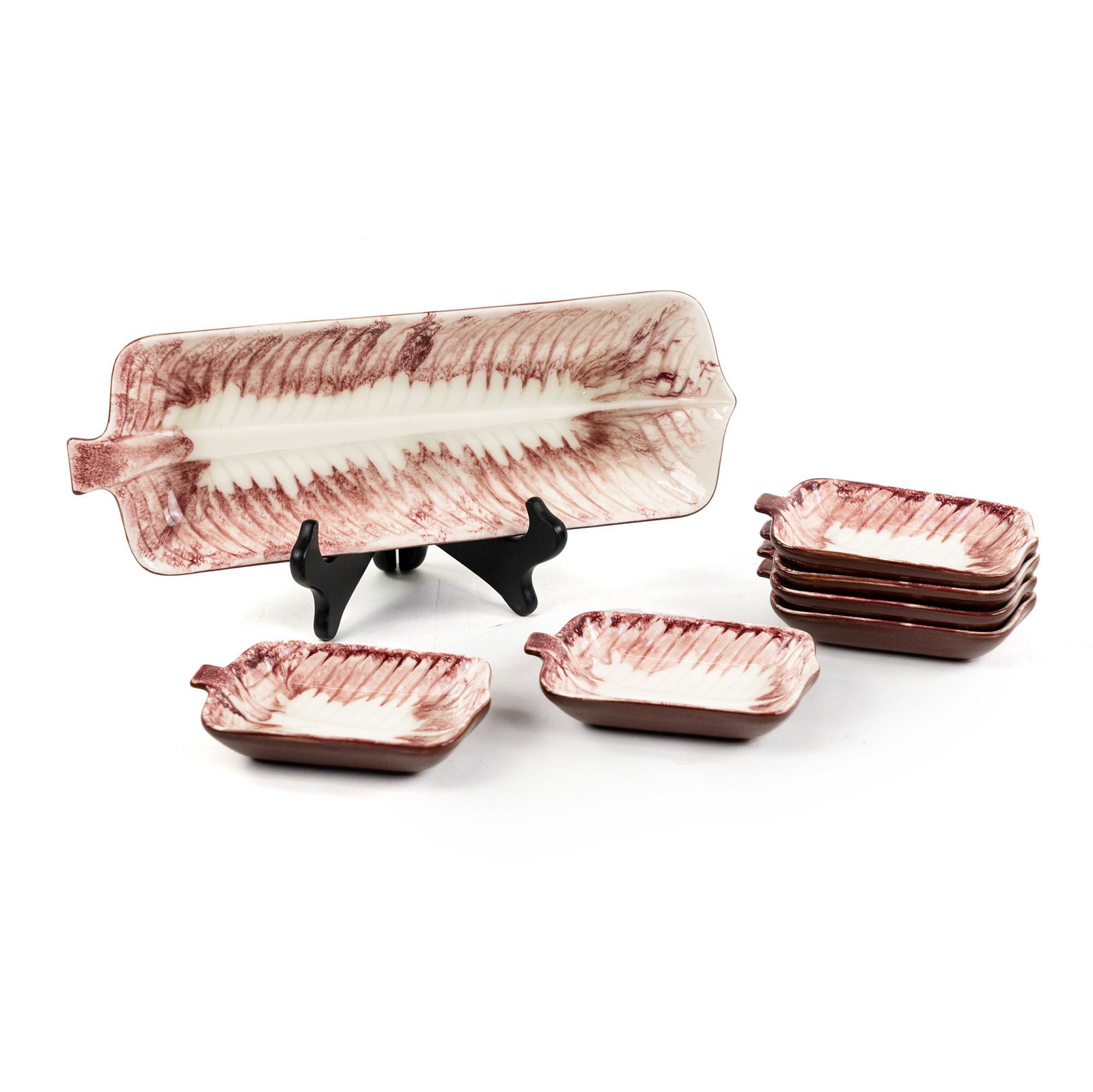 (7) Ucagco Japanese Ceramic Dinnerware Platters: A set of seven (7) Ucagco Japanese ceramic dinnerware platters having a red toned leaf motif.