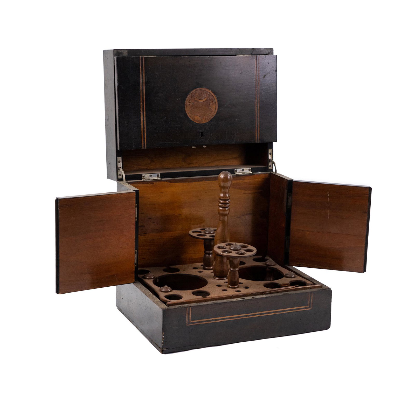 Marquetry Wood Cave A Liquor Cabinet: A marquetry inlaid cave a liquor cabinet having four rotating doors on metal hinges which fold out to reveal wood insert with openings for various liquor accoutrements. Unmarked.