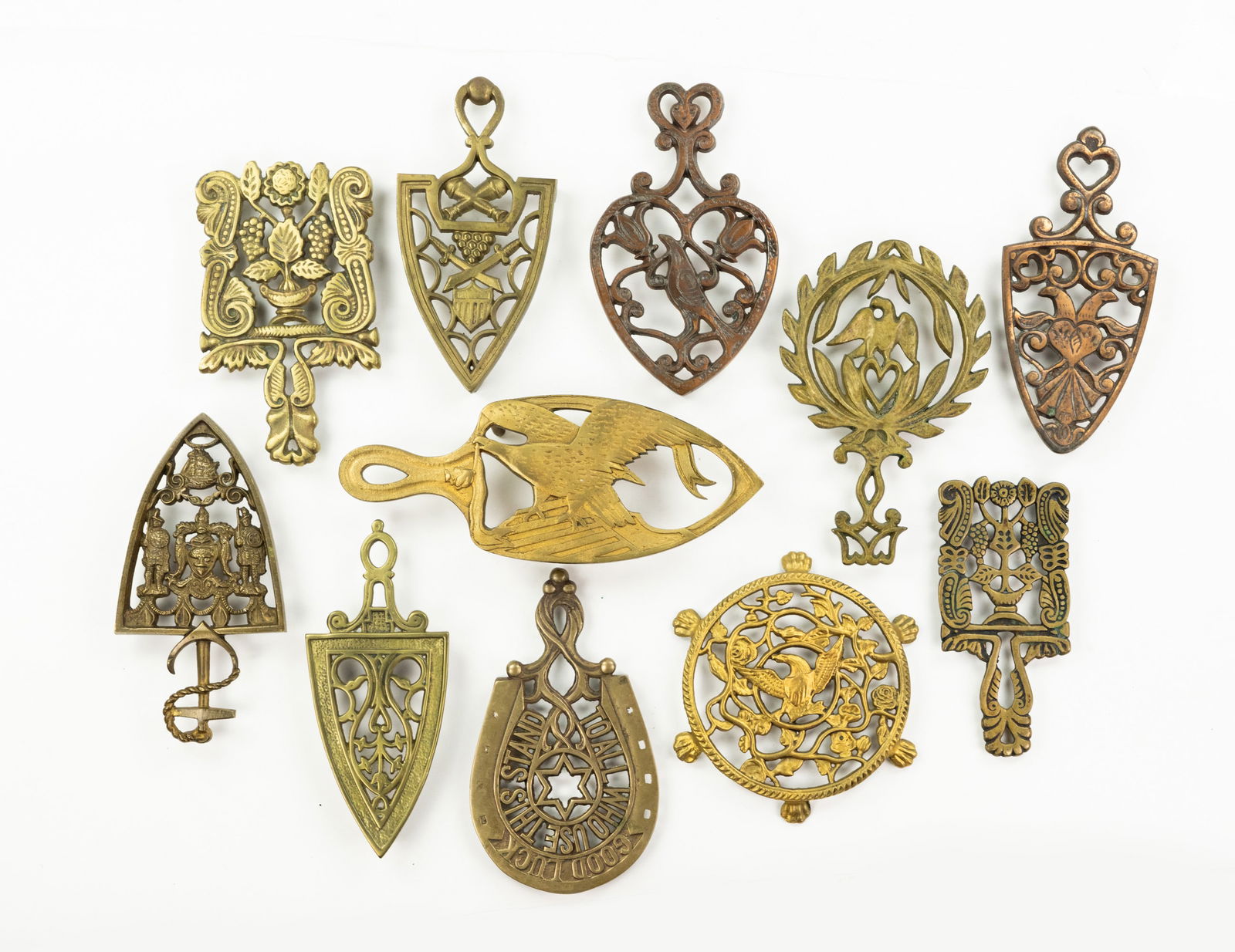 Grouping of Iron and Brass Trivets (1 of 3)