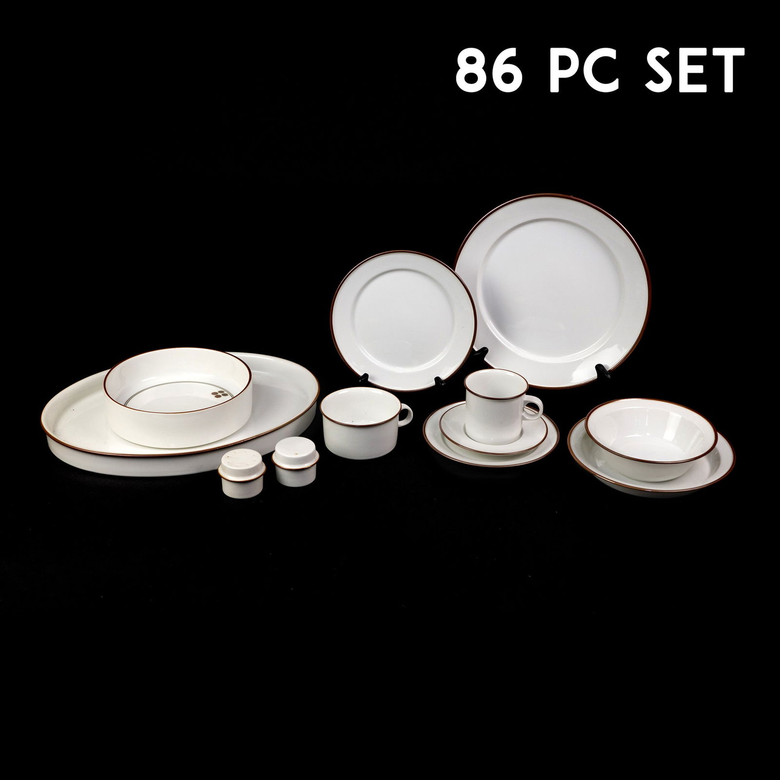 (86) Jens Quistgaard for Royal Copenhagen Domino Dinnerware: A set of eighty six (86) Jens Quistgaard for Royal Copenhagen Domino pattern dish set including sixteen dinner plates, sixteen salad plates, seven side plates, seven bowls, five shallow bowls, seven c