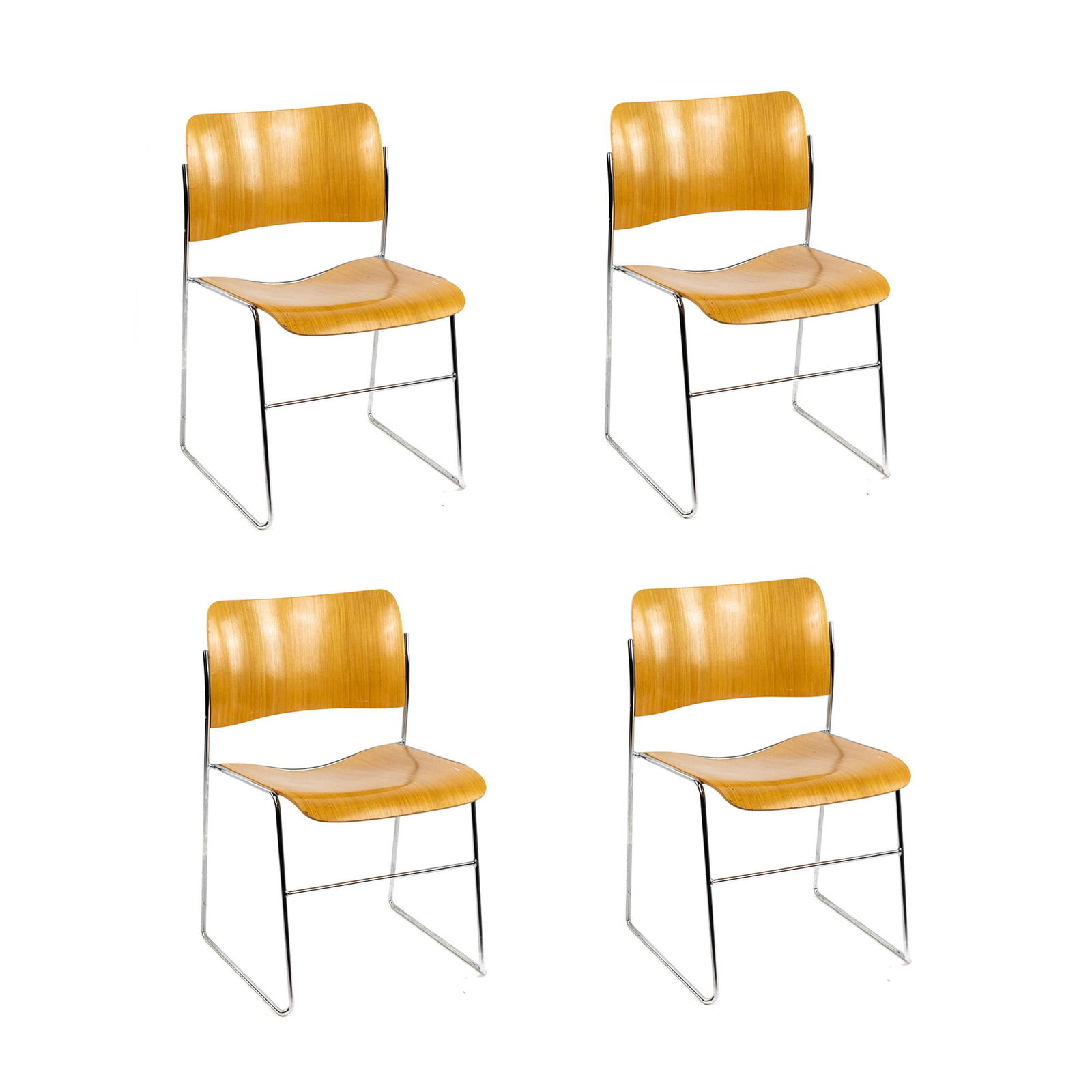 (4) Four David Rowland 40/4 Stacking Side Chairs: A set of (4) four David Rowland 40/4 stacking side chairs having a wood veneer seat and back on a chrome steel metal frame. Original labels on underside. Seat height: 16"
