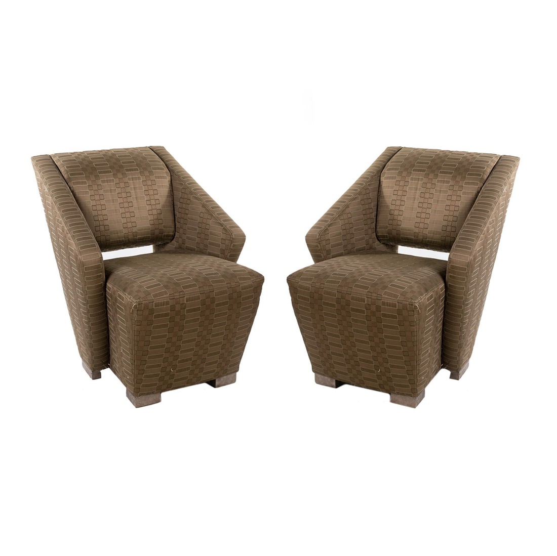 (2) Sculptural Upholstered Arm Chairs By Directional: A pair of post modern sculptural arm chairs by Directional having an open back and geometric patterned upholstery; each sits atop four block legs. Stickered on bottom.