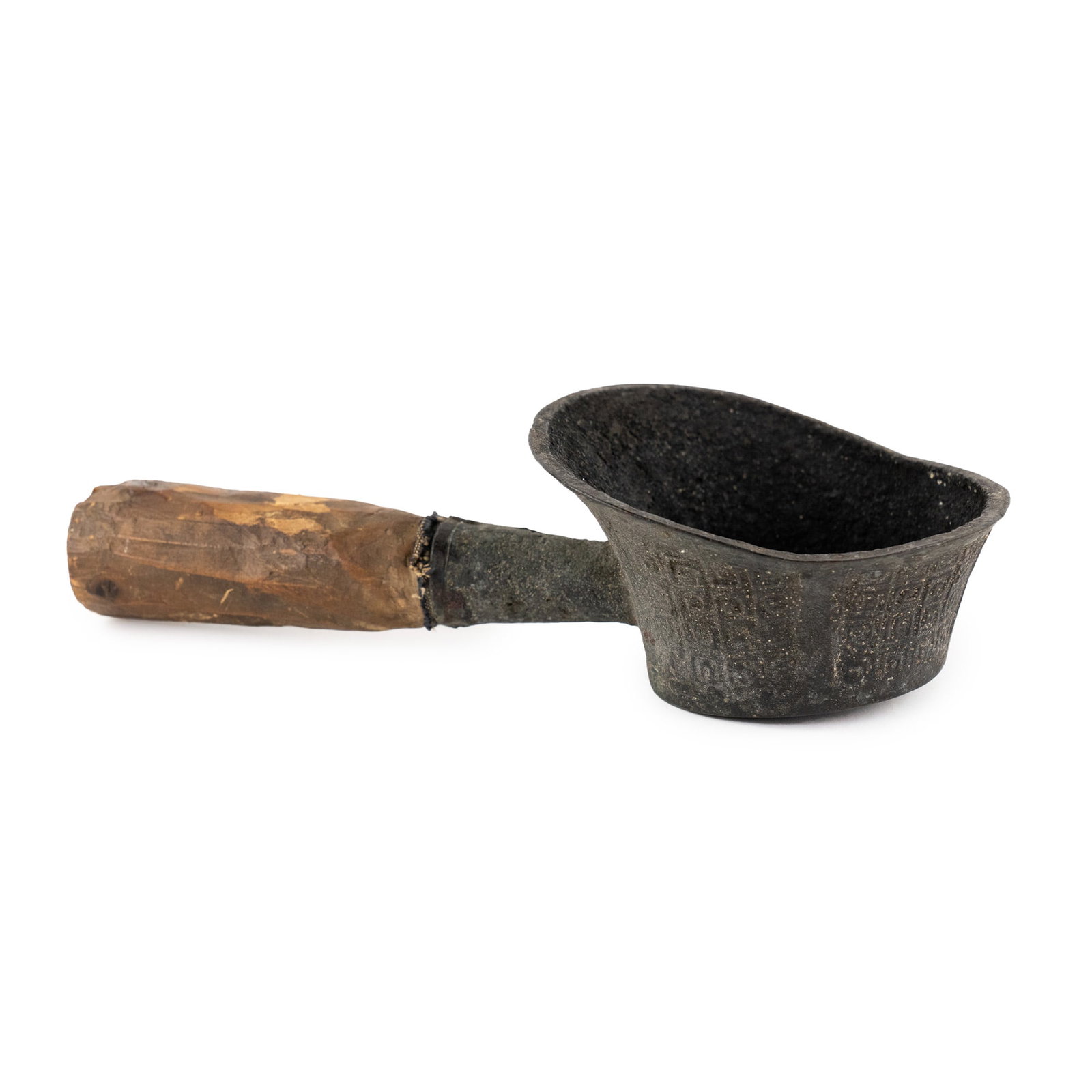 Chinese Charcoal Clothing Iron: A Chinese charcoal clothing iron having an iron bucket with a wide lipped basin and rough carved wooden handle and featuring a repeating spiral pattern on the outer wall of the basin. Export wax seal 