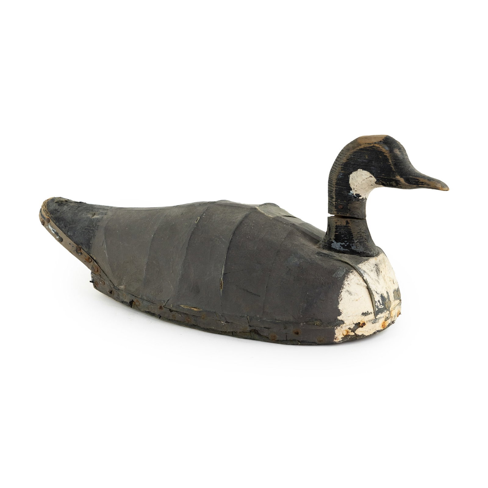 Antique Handmade Canvas Wrapped Canadian Goose Decoy: An antique, handmade canvas wrapped Canadian Goose decoy painted in black, white, and gray having a wood head and bottom with attached metal loop on underside. Unmarked.