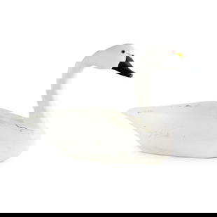 1983 Hand Carved L.D Scarborough Tundra Swan Wood Decoy: A 1983 L.D Scarborough hand carved Tundra Swan wood decoy painted white, black, and yellow with red and black eyes. Signed, dated, and marked Duck N.C on underside.