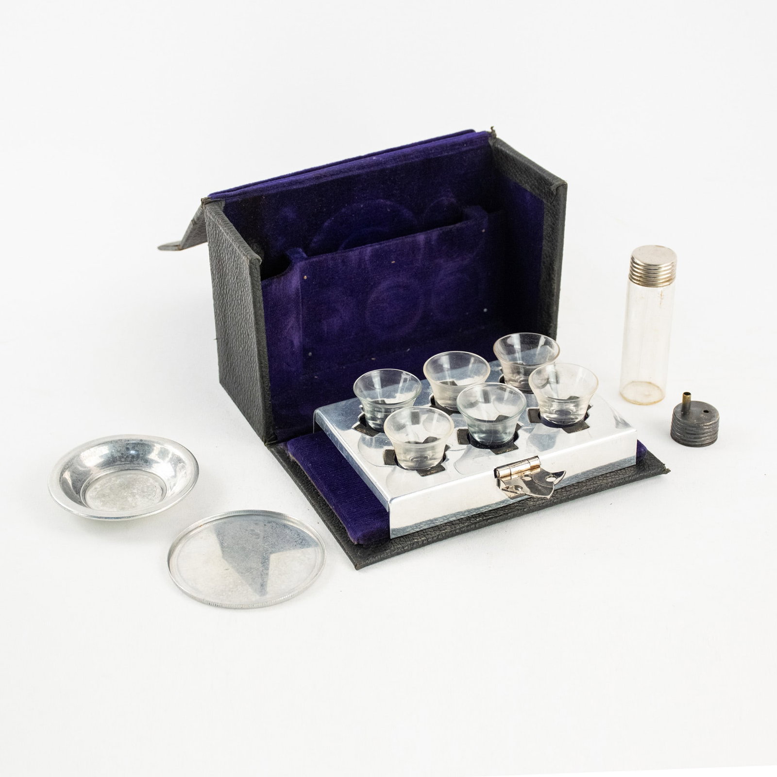 Silver Travel Holy Communion Last Rites Set: A silver and glass portable travel holy communion last rites set having six glasses, sacrament tray and bowl and small glass holy water bottle in case.