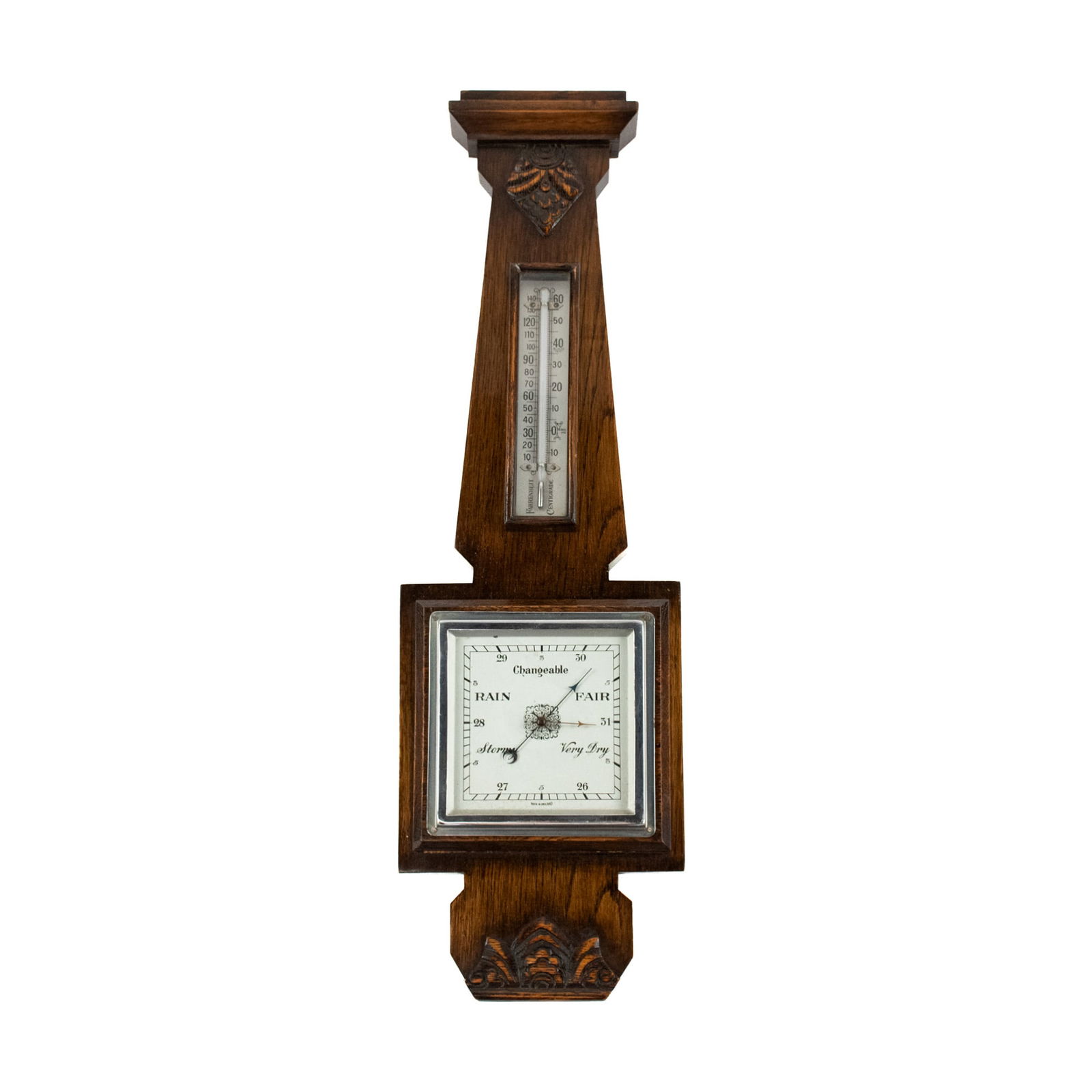 Vintage English Wood Barometer: A vintage English wood barometer having a square shaped face and small carved accents at top and bottom. Marked "Made in England" on face.