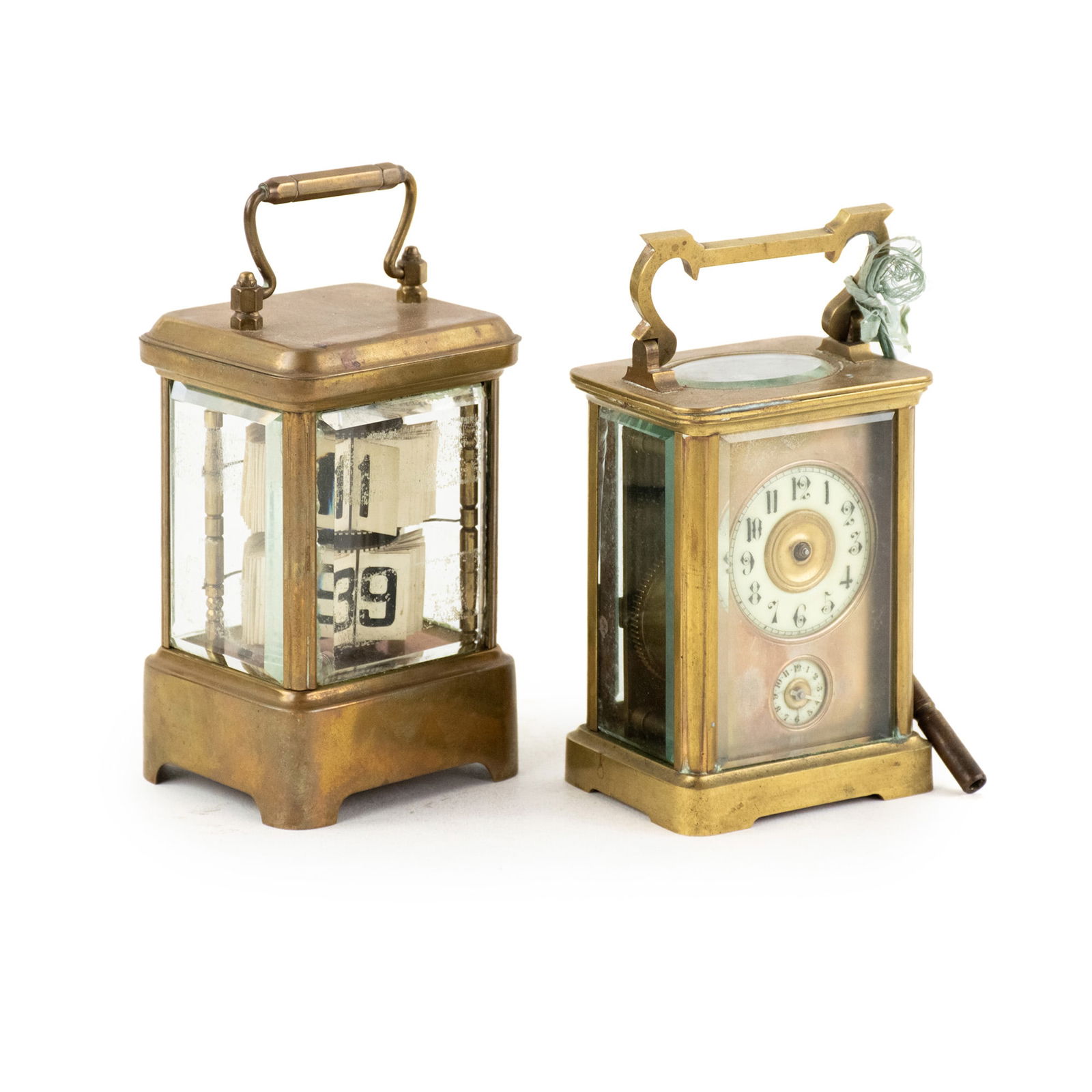 (2) Brass Case Carriage Clock incl. Ansonia Plato: A group of (2) brass case carriage clocks including a French obis clock with two porcelain faces, and an Ansonia Plato flip clock having a rotating flip time display in an obis style case. Also includ