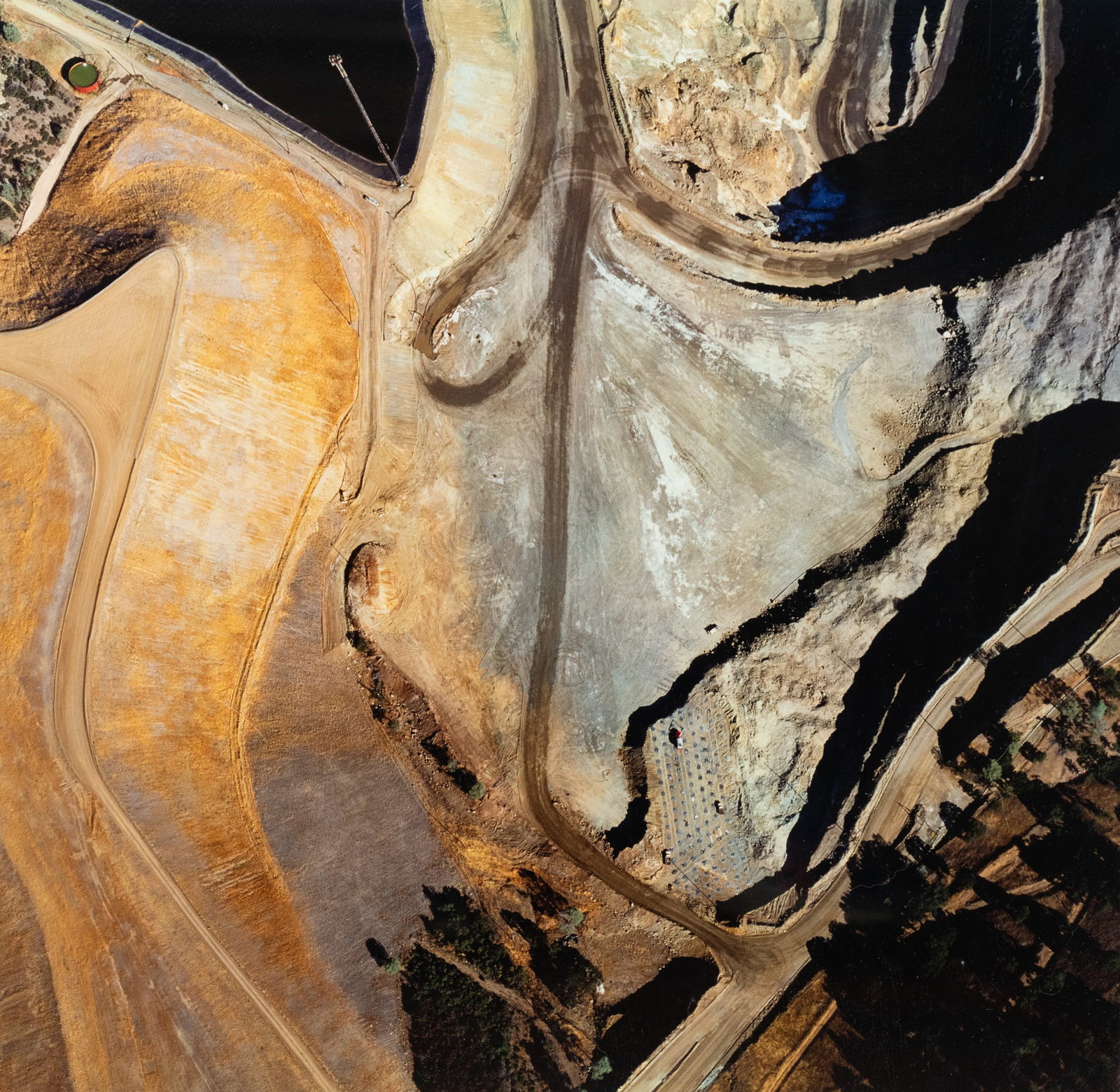 Robert Hartman 'Homestake Pit' Aerial Photo Print: A Robert Hartman aerial photograph print titled 'Homestake Pit' of the Homestake gold mine complex about eighty miles north of San Francisco. Presented in a pale wood frame. Dated on verso 1991 and ed