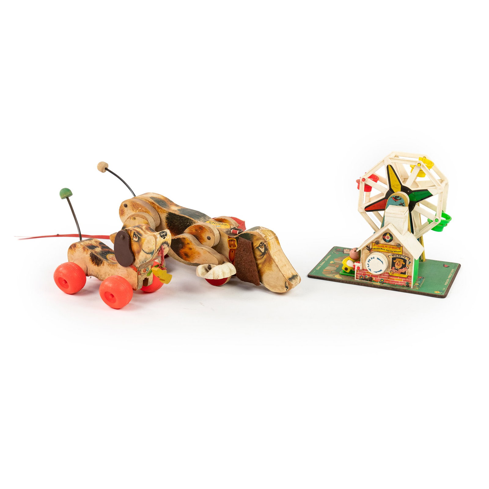 (3) Grouping of 1960's Fisher Price Toys: A group of three (3) Fisher Price toys including a Snoopy, Little Snoopy, and Music Box Ferris Wheel.
