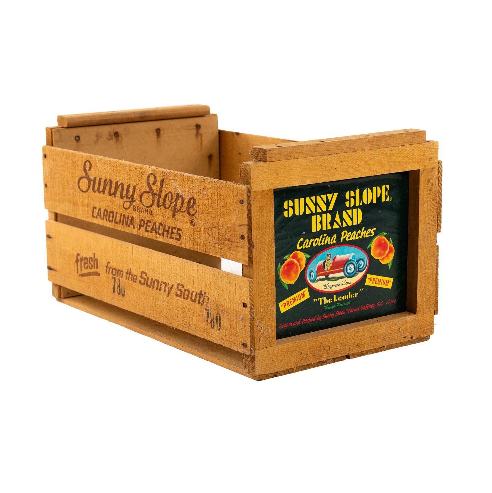 Sunny Slope Carolina Peaches Wooden Shipping Box: A Sunny Slope Carolina peaches wooden shipping crate or box having the Sunny Slope branding on all sides.