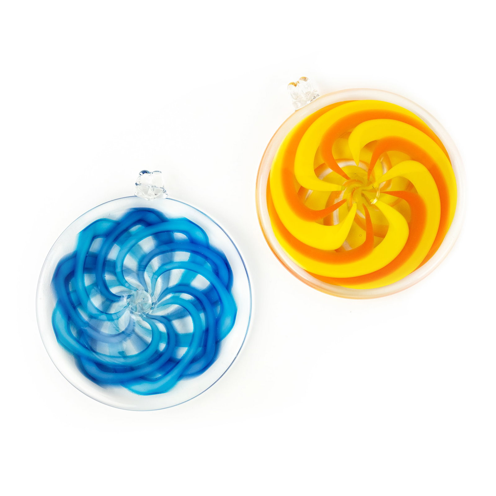 Pair of Kokomo Opalescent Glass Art Glass Ornaments: Studio: Kokomo Opalescent Glass Location: Kokomo, Indiana Medium: Studio art glass Description: A pair of circular art glass ornaments. Each incised signed on side.
