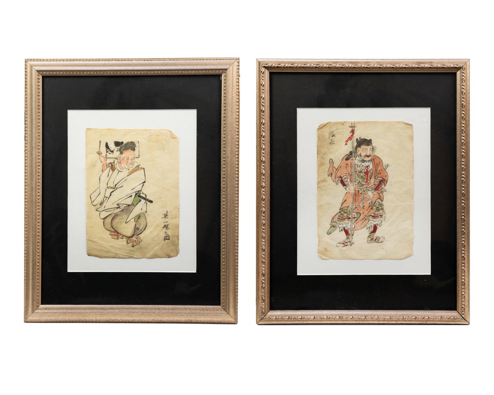 Pair of Japanese Politician Portrait Ink Block Prints: A pair of early Japanese ink block prints one depicting Chohi (Zhang Fei from Romance of the Three Kingdoms) with a spear and the painter Hanabusa Itcho (Ying Yi Die). Each presented in a frame behind