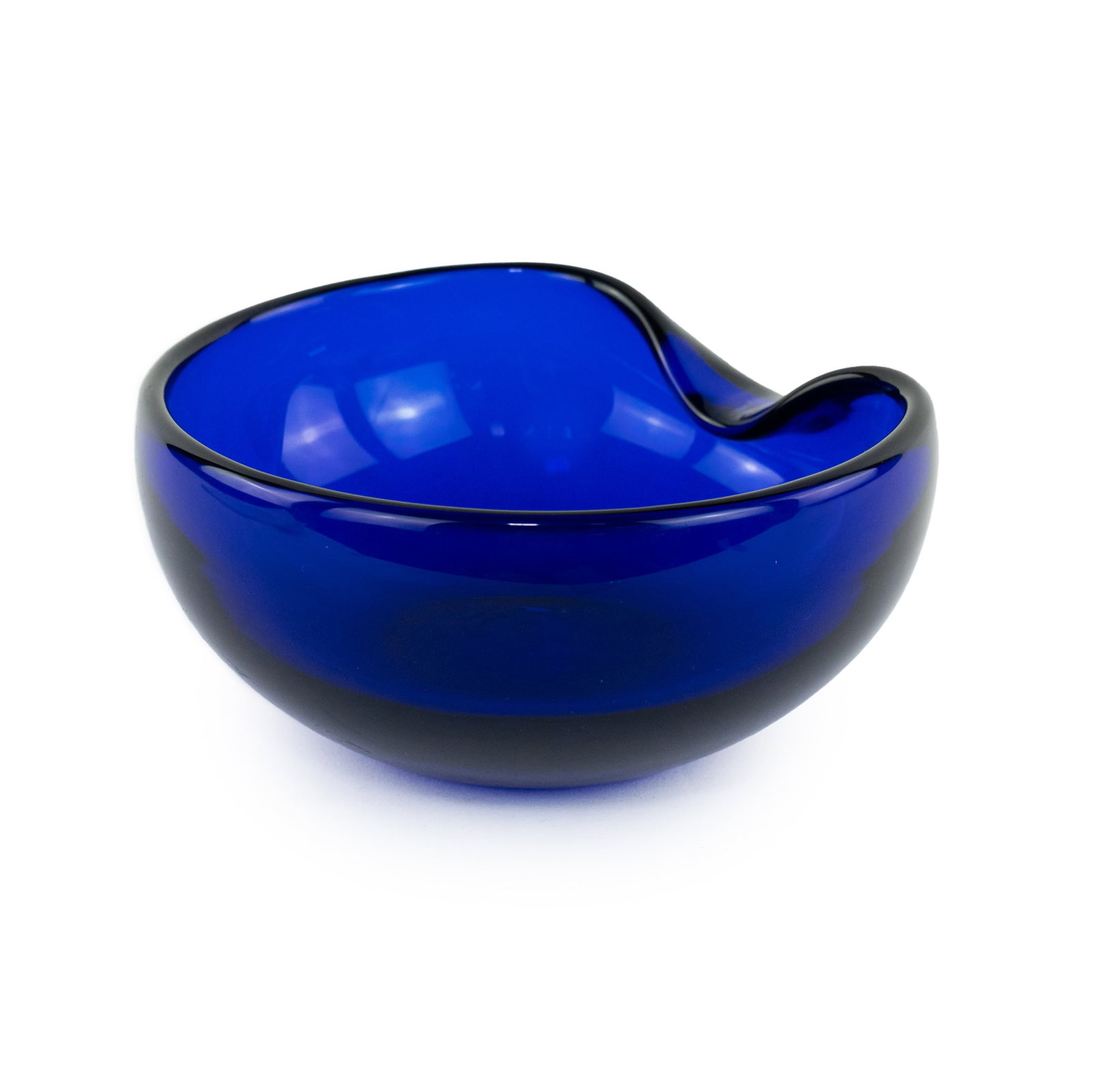 Elsa Peretti for Tiffany & Co. Blue Cobalt Thumbprint Bowl: Artist Name: Elsa Peretti Studio: Tiffany & Co. Location: New York City Medium: Studio art glass Description: A hand blown art cobalt blue glass thumbprint bowl. Incised signed on underside.