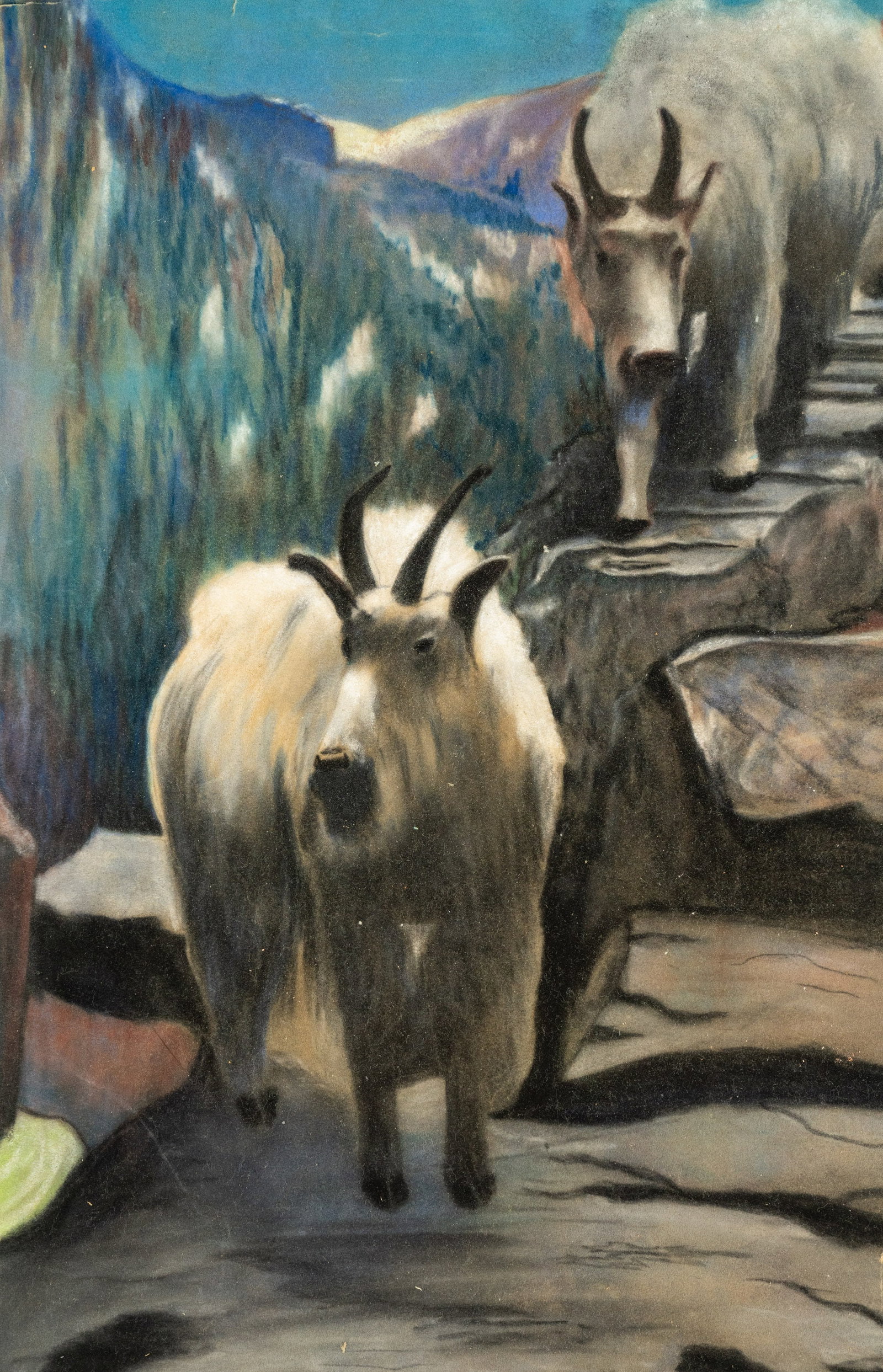 M.H. Herrin Mountain Goats Pastel on Paper Drawing: A M.H. Herrin (American, b. 1897) pastel on paper drawing depicting a pair of mountain goats climbing a stony path with a view of a mountain in the background. Unsigned. Unframed.