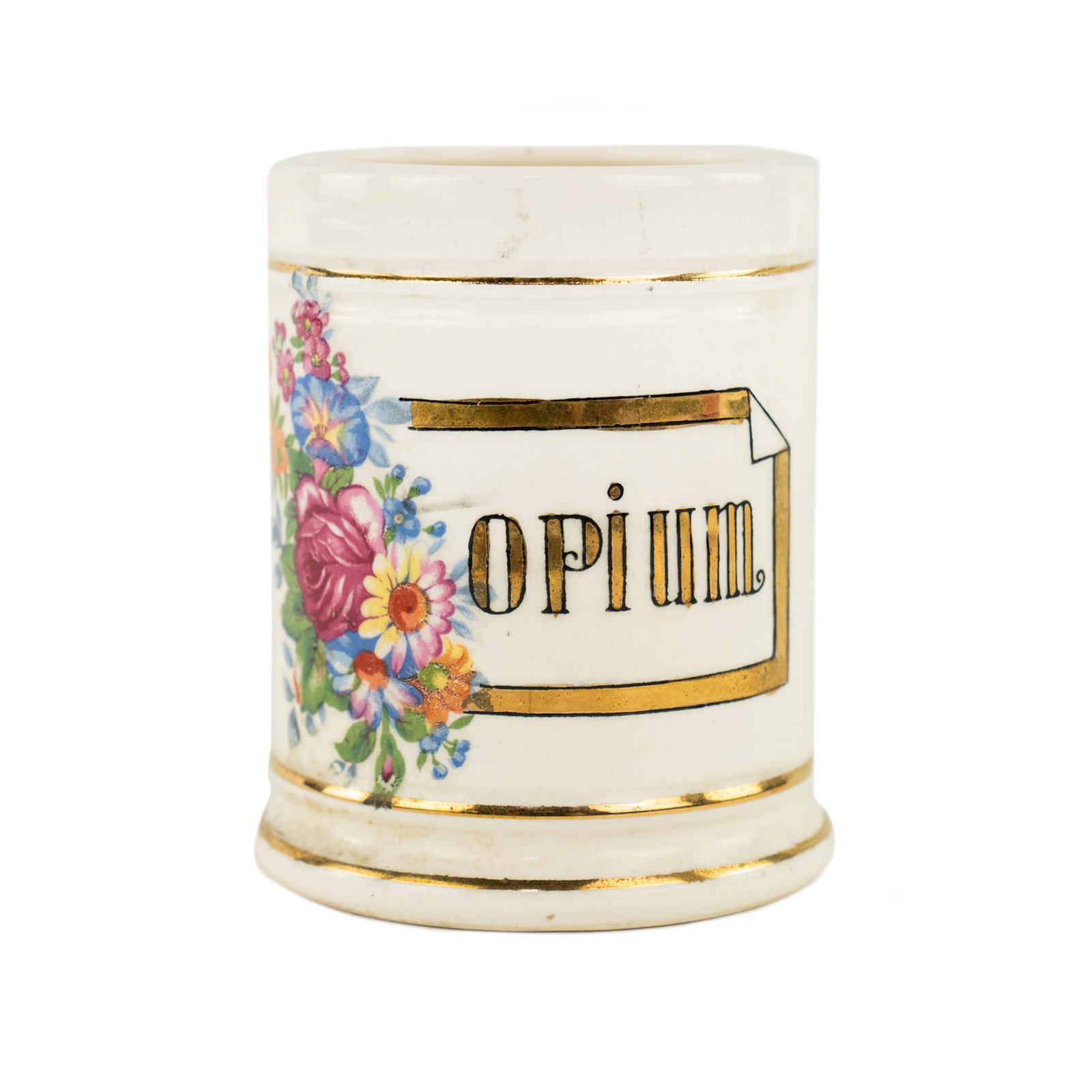 Japanese Export Porcelain Opium Jar: A Japanese export porcelain opium jar featuring hand painted lettering and floral motifs.