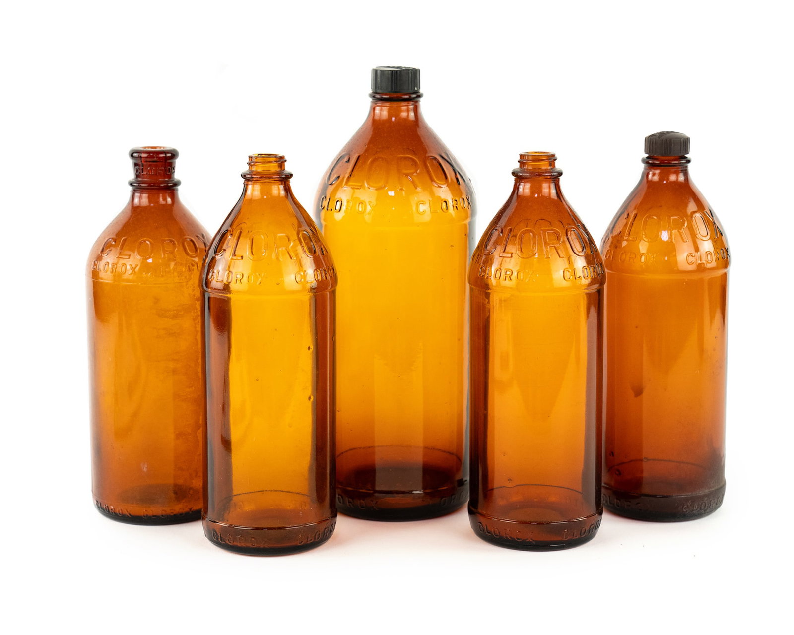 (5) Group of Brown Glass Clorox Bleach Bottles: A group of (5) Clorox bleach bottles each having embossed text on the near the spouts, bases and on the underside. Measurements are for tallest.