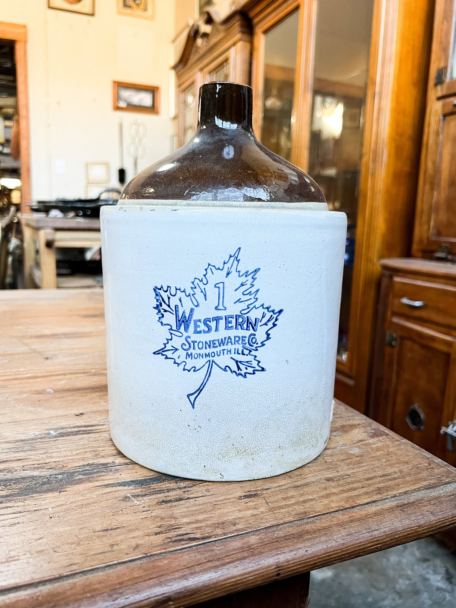 Western Stoneware 1 Gallon Jug Monmouth IL: A stoneware 1 gallon jug made by Western Stoneware in Monmouth, Illinois.