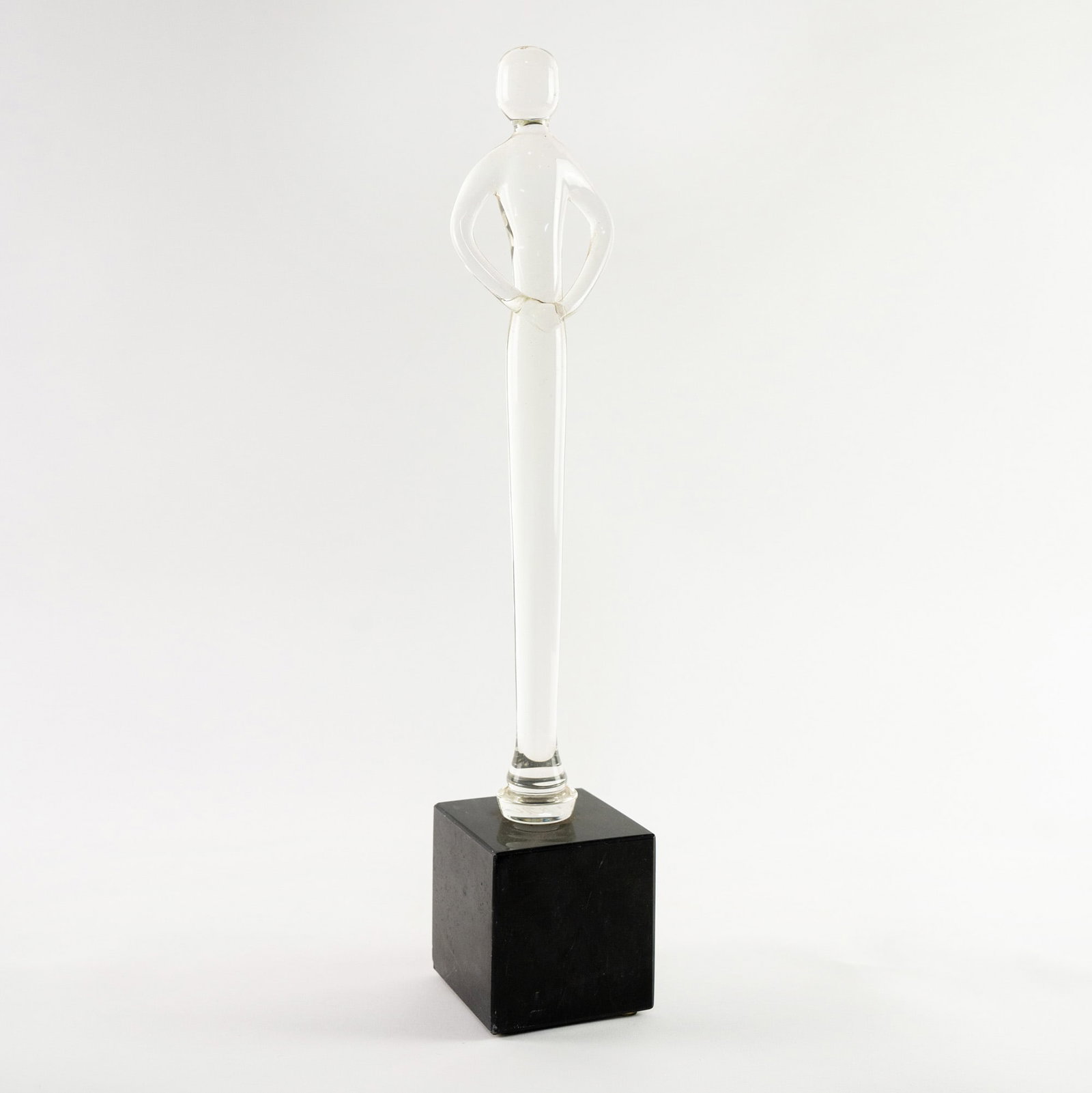 Thomas D Lillie Art Glass Abstract Figure: A Thomas D Lillie art glass abstract figure sculpture on a black plinth signed at edge of base. PICK UP The FINAL day to collect items or have them shipped is June 10th. NO exceptions. All pick ups wi