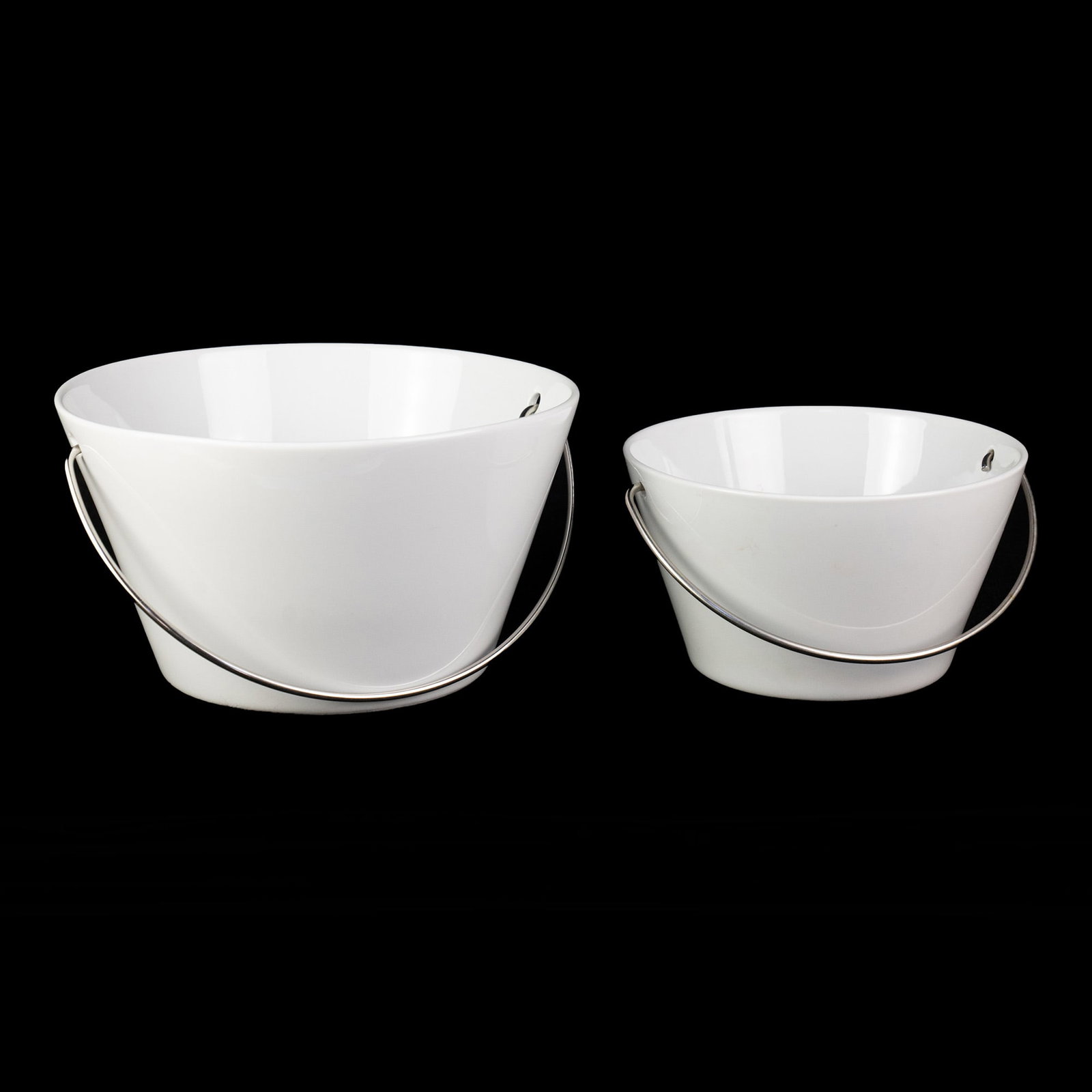 Pair of Eva Solo Porcelain Serving Bowls with Handles: A pair of Eva Solo porcelain serving bowls each having stainless steel handles. Each stamped on underside. PICK UP The FINAL day to collect items or have them shipped is June 10th. NO exceptions. All 