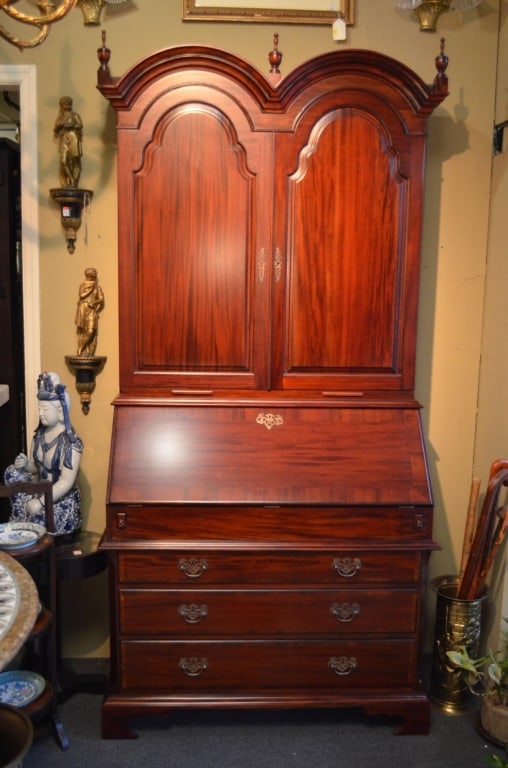 ENGLISH STYLE MAHOGANY FITTED SLANT-FRONT SECRETARY: English mahogany fitted slant-front secretary with 20 secret compartments throughout, contemporary. Note: Each lot in this auction was stored in an active industrial warehouse. Accordingly, lots may e