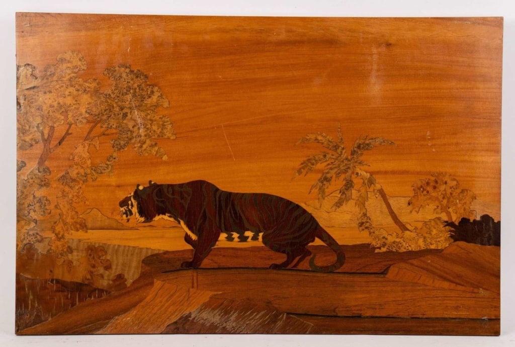 TIGER MARQUETRY WALL ART: Inlaid wood picture of a tiger in landscape; various wood veneers; rectangular panel; apparently unsigned; later hanging hardware. Note: Each lot in this auction was stored in an active industrial war