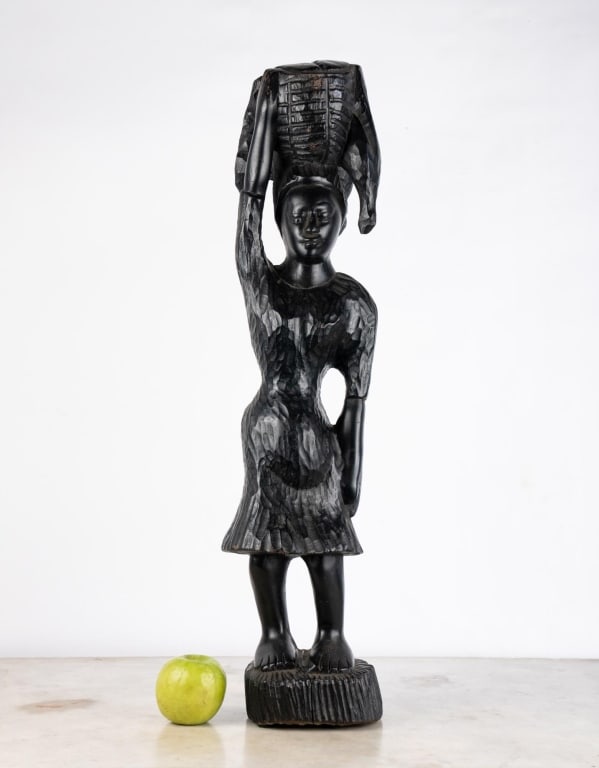 CARVED WOOD AFRICAN SCULPTURE: Carved wood African sculpture. Note: Each lot in this auction was stored in an active industrial warehouse. Accordingly, lots may exhibit dust and/or surface residue and may benefit from cleaning. App