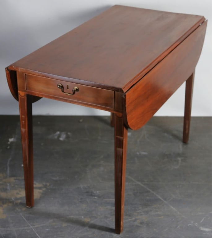ENGLISH ANTIQUE OVERSIZED MAHOGANY PEMBROKE TABLE: Antique inlaid oversized mahogany Pembroke table. Note: Each lot in this auction was stored in an active industrial warehouse. Accordingly, lots may exhibit dust and/or surface residue and may benefit