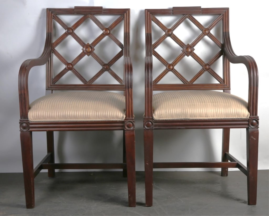 ENGLISH MAHOGANY MODERN CARVED ARMCHAIRS: English mahogany modern carved armchairs. Note: Each lot in this auction was stored in an active industrial warehouse. Accordingly, lots may exhibit dust and/or surface residue and may benefit from cl